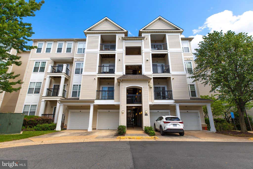 Photo of 11321 Aristotle Drive #3-303, FAIRFAX, VA 22030 (MLS # VAFX2333012)