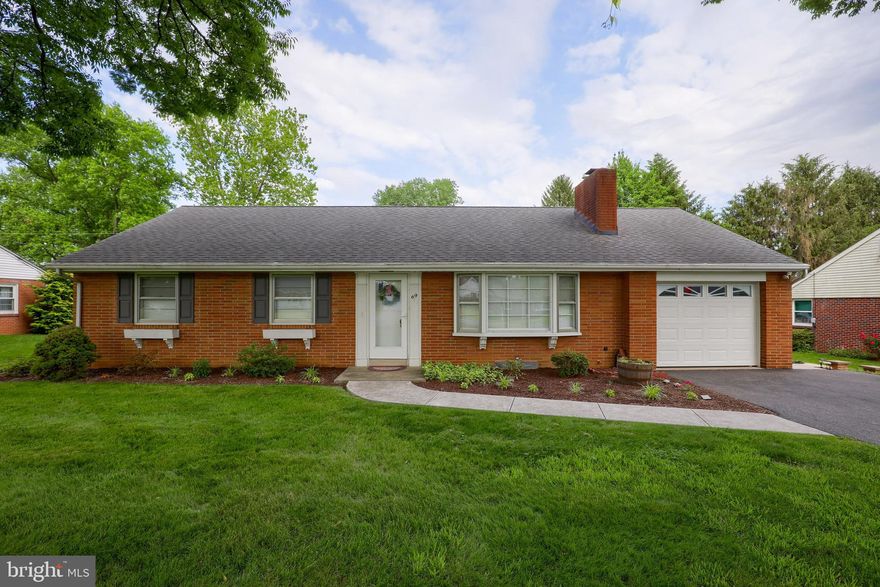 Enjoy convenient one floor living with this well cared for rancher. Home features a spacious eat-in kitchen with cherry cabinets and recessed lighting, cozy family room with fireplace, and partially finished basement that includes a second kitchen. Full attic offers lots of storage space. Relax outdoors from the covered patio that overlooks the private backyard.  Water is turned off.