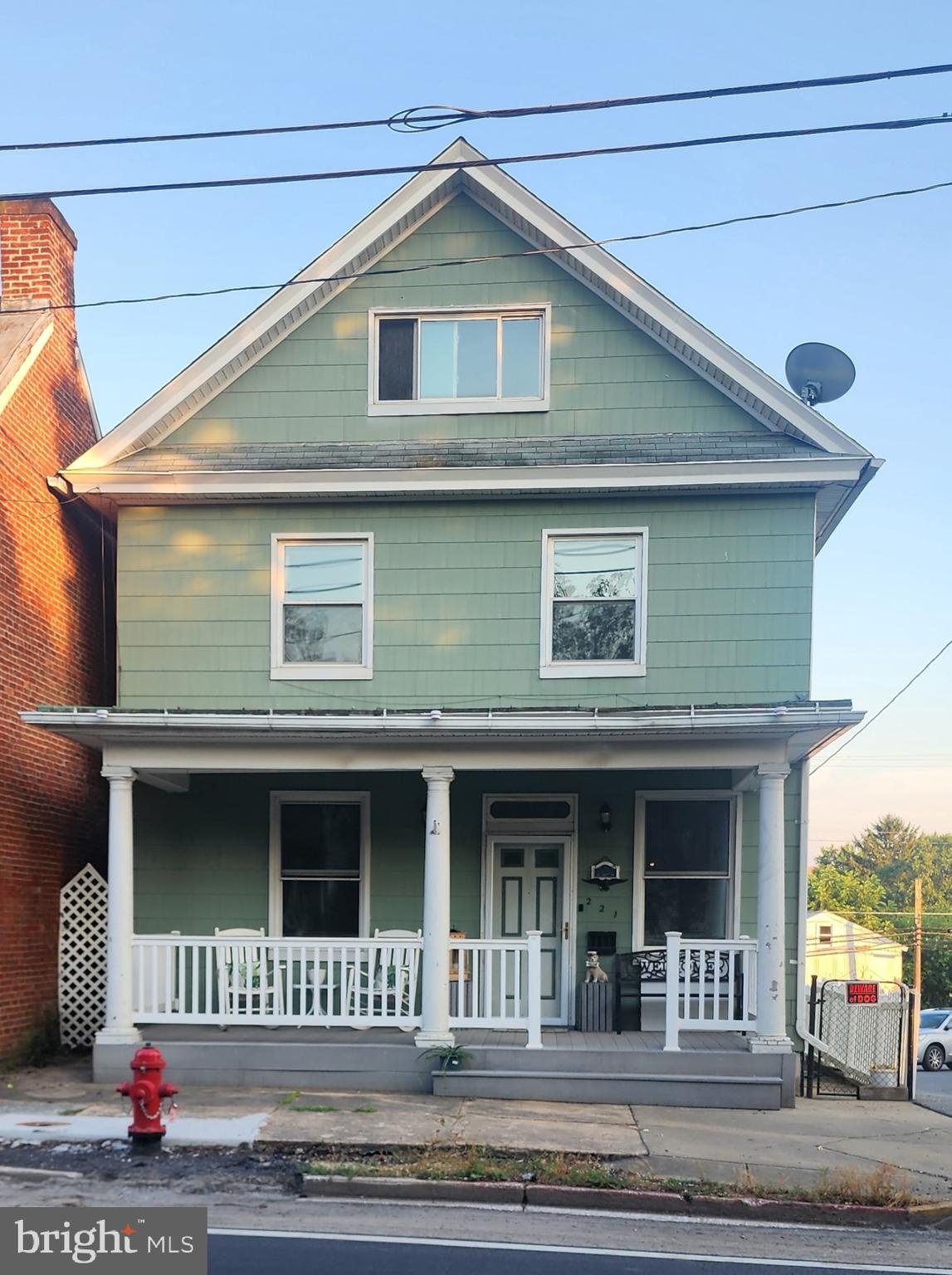 Here's your chance to own a piece of history in charming New Windsor! This beautiful 4-bedroom home offers over 100 years of timeless character, featuring original hardwood floors throughout and three fully finished levels. The expansive attic provides an incredible opportunity to create additional living space tailored to your vision. Enjoy relaxing or entertaining in the huge yard—perfect for gardening, play, or outdoor gatherings. A rare opportunity to own a home with historic charm and modern potential in a peaceful, picturesque setting!