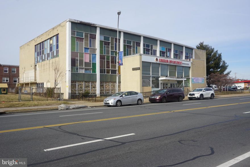 Enormous 24,000 square foot building at the corner of Bustleton and Unruh in Northeast Philadelphia.    Currently used as a Church, Nursery, and School with two floors.  It begins with an impressive two story entrance Foyer.  The first floor consists of offices, class rooms, restrooms, a kitchen,  and meeting rooms.  The second floor has two enormous rooms with 25 foot ceiling height, each with its own stage and separated by a movable wall to become one large venue. The open span construction allows for many potential fit outs and uses.  Some upgrades have been made to heat, and electric.  This building is waiting for the next business to restore this great venue.