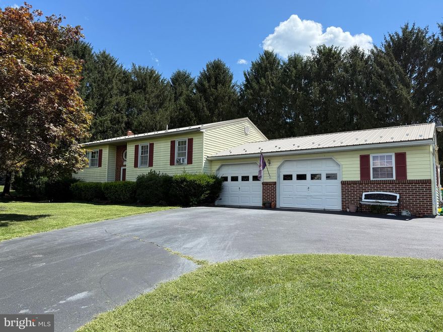 Welcome to this inviting bi-level home on a spacious .45-acre tree lined lot, situated across from open land for added privacy and peaceful views, located in the South Middleton School District (Boiling Springs High School). 
Before scheduling a showing, please take a moment to watch the pre-recorded video tour by clicking the pink and gray camcorder icon in the upper left-hand corner—or ask your agent to send it to you. This will help confirm your interest and give you a great first look at everything this home offers.
A 1 Year Home Warranty will be included for peace of mind. 
With a balance of indoor and outdoor spaces, the interior offers flexibility and comfort with a spacious living room, dining area, and kitchen with a double sink and pantry closet. The lower-level den features a bar, ideal for entertaining. There is gas cooking and electric hot water and baseboard heat. For those who appreciate alternative heating options, there are three gas wall heaters and even a coal-burning stove. 
Step outside and enjoy the in-ground pool, deck, and side yards—perfect for summer gatherings. This home also features a spacious two-car garage, a durable metal roof, and replacement windows.
Here, it blends charm, function, and value, all in a location that keeps you close to nature while still being convenient to local amenities. Schedule your personal showing today.