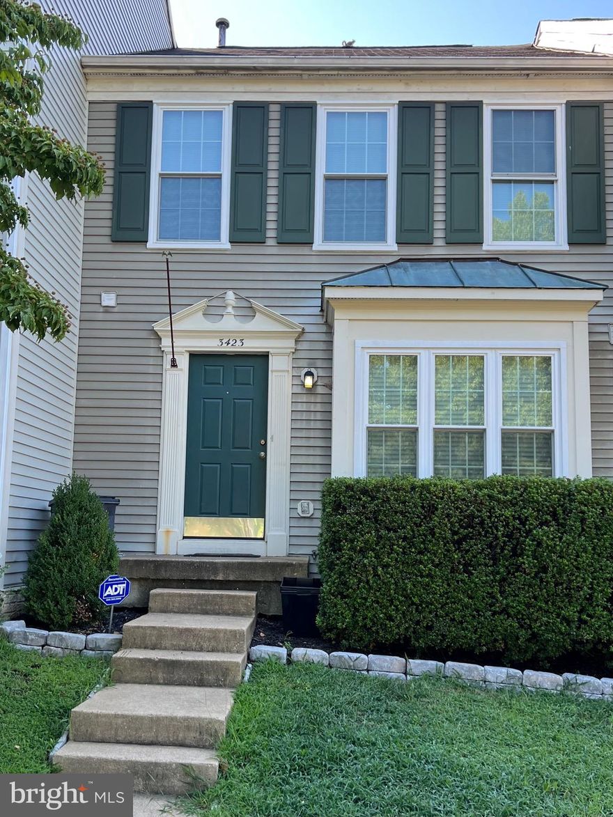 This gorgeous 3-level home home features 3 bedrooms, 2.5 bathrooms and 2 assigned parking spaces. Brand new carpet and fresh paint throughout! Main level has  living room, spacious dining room, kitchen and half bathroom. Basement has a large recreation area and walks out to a fenced yard. Available immediately. Walk to bus stop. Community has play grounds, pool and tennis court.