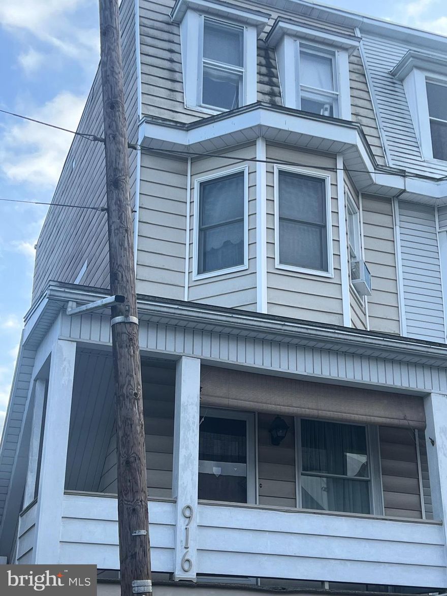 LARGE 3 BEDROOM HOME IN NORTH SCHUYLKILL SCHOOL DIST AT 916 WALNUT ST ASHLAND.   ONE MORE ATTACHED PARCEL GO WITH THIS SALE.  THERE ARE TWO UNHEATED LARGE BEDROOMS ON 3RD FLOOR.   UPDATED KITCHEN WITH  OPEN COUNTER AND BREAKFAST AREA.  POWDER ROOM OFF KITCHEN.   NICE PATIO AND COVERED PORCH OFF KITCHEN FOR THAT MORNING COFFEE OR TO RELAX IN THE EVENING.  FENCED YARD FOR THE CHILDREN AND YOUR FURRY FRIENDS.  THERE IS A ONE CAR GARAGE AND A CARPORT AT THE END OF THE 125 FT YARD.  FORMAL DINING ROOM AND LIVING ROOM ARE TWO MORE FEATURED ROOMS TO HAVE FAMILY FUN OR JUST WATCH TV.   FRONT ENTRANCE FROM THE STREET TO THE BASEMENT THAT HAS THE LAUNDRY AREA AND ROOM FOR A WORKSHOP  AREA.  HOME HAS ELECTRIC HEAT.
