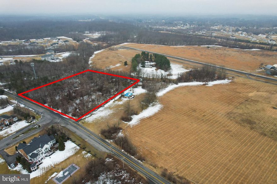 This is a large level lot almost next to the Freeway Airport which is currently proposed to be redeveloped into 297 single family homes.  The property is shown in the tax records as being 3.84 Acres. The red outlines on some of the aerial photos are approximately correct.  The rear boundary is a stream.  The boundary closest to the airport is a gravel driveway. The property includes a single family detached home which has been vacant for several decades and may not be accessed without a Hold Harmless agreement, plus what remains of a tobacco barn and a chicken coop.  The land records go back to the 17th century.  The owner has a survey which was done in 1952.  There are currently flags and a sign on the property belonging to one or more developers which were not authorized and have nothing to do with the current ownership.  RE/MAX signage at both ends of street frontage, but accuracy not guaranteed.

From the owner per survey done in 1952 The front line on Church Road is listed as 183.84191.68 plus 184.88 for plus 185.15 for the sides of the kink for the center of the road description for total 368.99, the side with the squat house is 499.16 feet, the side of the tower is 418.60 feet and the back side 184.66 feet plus 191.68 for marked  for 376.34.  He has the original survey.