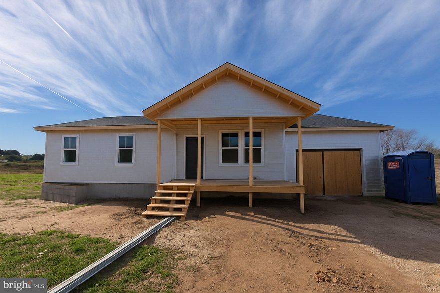 This new construction home offers the peace of mind, efficiency, and clean design only new builds can provide, all within a growing neighborhood positioned for increasing long-term value. Step inside to an open-concept living and kitchen area filled with natural light, vaulted ceilings, LVP flooring, and modern fixtures throughout. The living space is fitted with skylights that can be covered with just the touch of a button. The kitchen will feature sleek stainless steel appliances, granite countertops, rich cabinetry, and a layout that flows seamlessly into the main living space. The home offers three well-sized bedrooms, including a primary suite featuring its own en suite bath.  The bathrooms are even fitted with lit, anti-fog mirrors!  Every detail inside reflects durable, energy-efficient construction—from the windows to the ductwork to the upgraded finishes—ensuring comfort and low operating costs year-round. Outside, the property sits on a spacious lot within a neighborhood undergoing steady growth, making it an incredible opportunity to get in early within an up-and-coming community. Whether you’re a first-time buyer, downsizing, or simply looking for a modern home with no renovations required, this new construction delivers style, efficiency, and long-term value.