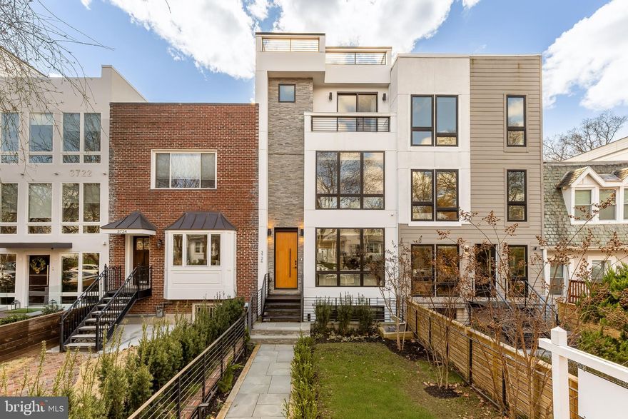 Tucked into the heart of Burleith, 3726 R Street NW offers the rare opportunity to own a contemporary residence with over 4,100 square feet of thoughtfully designed living space in one of Washington’s most desirable locations. Built in 2023 and enhanced with custom upgrades throughout, this five bedroom, five and one half bathroom home blends architectural sophistication with everyday comfort. Wide plank white oak floors, oversized black framed windows, a floating staircase with steel detailing, and an elevator servicing all levels create a polished and seamless living experience from the moment you step inside.

If you love the energy of Georgetown but crave the space and ease of a modern home, this is the balance you have been waiting for. Here, you enjoy a refined contemporary aesthetic, open sightlines, and curated finishes that go far beyond builder grade. The Italian Scavolini kitchen with marble surfaces and a full suite of Monogram appliances anchors the main level, while floor to ceiling sliding doors connect indoor and outdoor living with ease.

Four fully finished levels provide remarkable flexibility. Each bedroom features its own en suite bath, including a serene primary suite with a private balcony and spa inspired bath. The lower level offers a recreation room, wine cellar, wet bar, and guest suite. Above it all, an expansive rooftop terrace spans the length of the home and offers sweeping views, ideal for entertaining or unwinding at the end of the day. A detached two car garage adds convenience rarely found in this location.

Living in Burleith means enjoying a peaceful residential setting just moments from Georgetown’s shops and restaurants along M Street and Wisconsin Avenue. Nearby trails in Glover Archbold Park and the C&O Canal Towpath offer easy access to nature. It is a lifestyle that pairs walkability, green space, and modern luxury in one exceptional address.