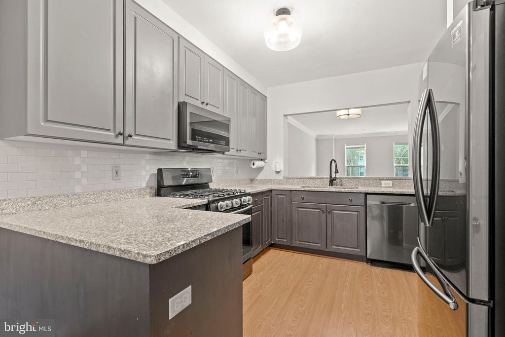 Photo of 1530 Northern Neck Drive #102, VIENNA, VA 22182 (MLS # VAFX2276188)