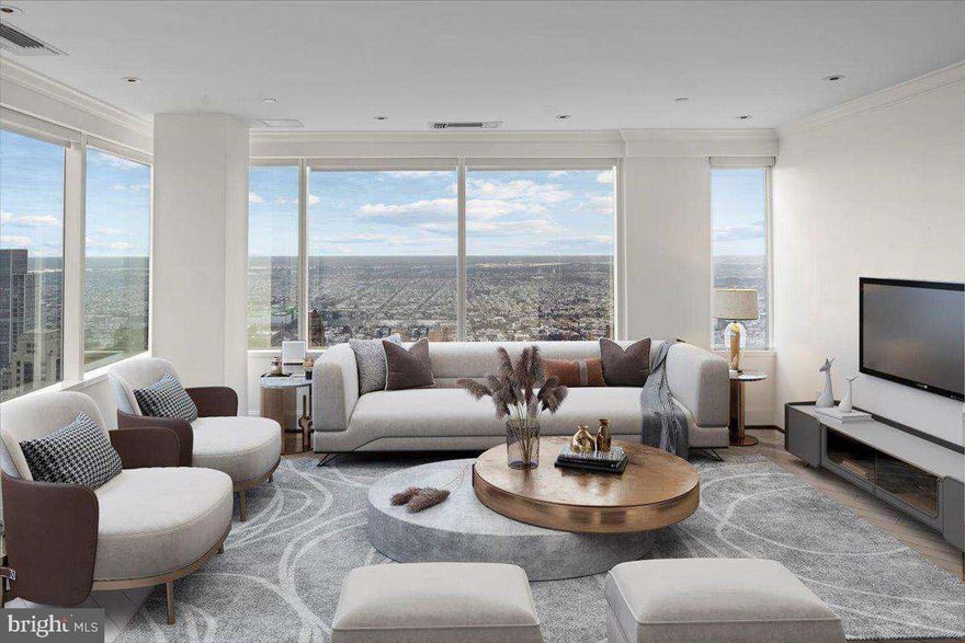 Sweeping 270º unobstructed view from this corner unit at The Residences at Two Liberty Place - the best in the building. This recently remodeled, exquisite unit features a fantastic gourmet kitchen with every upgrade imaginable, the best appliances, tremendous living room and dining room with windows surrounding both rooms, upgraded mahogany diagonal flooring throughout the living room, kitchen/dining area, hallways, and den/third bedroom, custom lighting, electric remote control sun shades on the windows, very large master suite with private bath and huge walk in closet, 2nd large bedroom & an additional room that could be used as an office, den, or third bedroom. 40th Floor location means best Wi-Fi signal, phone connection, and water pressure in the building. Express elevator to the 40th Floor means no waiting.
The Residences at Two Liberty Place offers 5-star hotel amenities including private chauffeured driven Cadillac Escalade car service, 24-hour doorman, 24/7 concierge, valet parking, a newly-redesigned Owner's Club/lounge/media room, Fitness Center with Yoga Studio, Endless Pool, Personal Trainers, and massages.