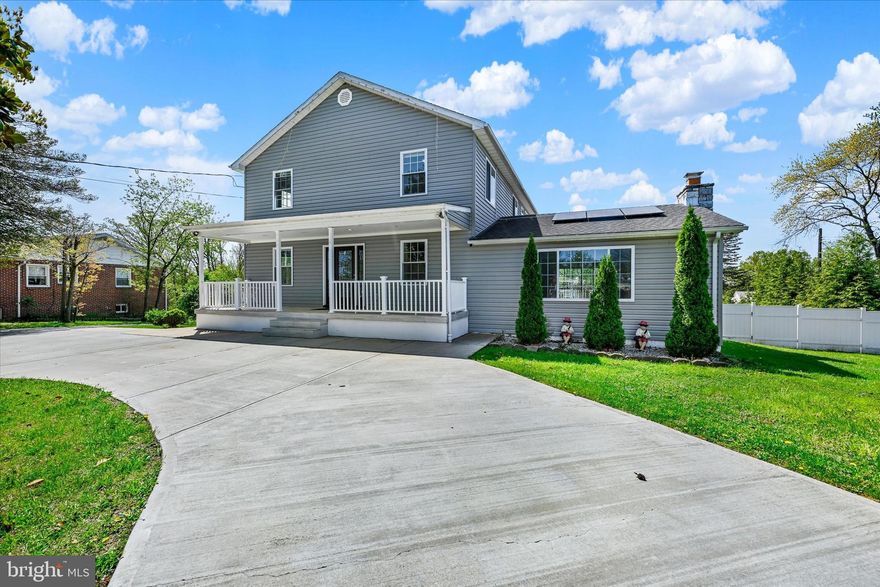 Welcome to 6615 Kenwood Avenue—an exceptional, move-in-ready retreat set on just over one acre, where thoughtful upgrades and timeless comfort come together in perfect harmony.

From the moment you arrive, the inviting circle driveway and expansive parking area set the tone for convenience and curb appeal. In addition to the attached two-car garage, a separate detached garage/carport and extended driveway provide ample space for vehicles, guests, or hobbies. The home’s vinyl siding and beautifully maintained exterior offer both durability and charm, while the fully fenced yard enhances privacy.

Step onto the welcoming front porch, where a cozy sitting area invites you to relax and enjoy the peaceful surroundings. Inside, you’re greeted by a freshly painted interior filled with natural light, recessed lighting, and stunning hardwood floors that flow throughout the main living spaces, with soft carpeting in the bedrooms for added comfort.

The heart of the home is the stunning, fully updated kitchen—renovated in 2018—featuring stainless steel appliances, updated countertops, a stylish backsplash, and a large center island perfect for gathering and entertaining. The open-concept layout seamlessly connects the kitchen to the spacious family room, while the adjacent dining area showcases a beautiful decorative stone wall. A striking stone fireplace anchors the living room, which opens directly to a large deck overlooking the backyard oasis.

Designed for flexibility, the main level offers a bedroom and full bathroom—ideal for guests or convenient one-level living. Upstairs, you’ll find additional carpeted bedrooms, along with a thoughtfully placed laundry area complete with washer and dryer for everyday ease.

The spacious primary suite is a true private retreat, featuring a walk-in closet and a beautifully updated en-suite bathroom with a soaking tub, walk-in tiled shower, and double vanity. A newly added electric fireplace insert adds warmth and ambiance, creating a serene escape.

The lower level expands your living space with a finished area featuring ceramic tile flooring, a convenient half bathroom, and direct access to the attached garage—complete with a unique dog washing station.

Step outside to your own private paradise. The backyard is an entertainer’s dream, boasting a gorgeous saltwater pool, a stunning pavilion, and expansive open space—all set within a fully fenced yard that offers both beauty and seclusion.

Additional highlights include a 200-amp electrical panel, dual-zoned HVAC system, and leased solar panels for energy efficiency and savings.

Completely renovated in 2018, this home is truly turnkey—offering the perfect blend of comfort, style, and outdoor luxury.

Schedule your tour today!