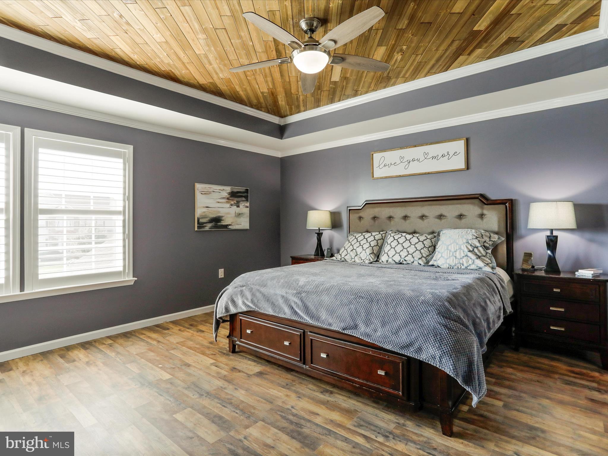 ** BACK TO ACTIVE …sometimes life throws curve balls…Seller had to take temporarily off market due to not being able to accommodate showings for 14 days**
A buyer's dream. Welcome home to 56 Tennyson Ct situated, in sought after South Berkeley County, on a beautiful cul-de-sac homesite in the upscale Springdale Farm Community. Meticulously cared for home with only 1 owner to date. Drive up to see your manicured lawn and welcoming front porch ready for you to enjoy the summer evenings or a morning coffee. Open the front door to your beautiful foyer area highlighting Luxury Vinyl Plank flooring on the entire main level. Powder Room and Coat closet conveniently located off the entry way. A formal living room and dining space open up to each other creating the perfect gathering place for guest or flex spaces to use as your heart desires. Stunning kitchen with dark maple cabinets, stainless steel appliances, granite counters and a generous size morning room with breakfast bar that can easily be used as your dining space as well. Large pantry for an excellent storage opportunity. Family room right off the kitchen for everyday convenience. Find your way up to the primary suite where the trail ceiling will capture your attention with the custom woodwork complimenting the flooring. Oversized walk-in closet with a secondary closet included as well. Deluxe Primary Bathroom Suite with Corner Soaking Tub, Double Sinks, Private Water closet and beautiful Barn Door! Three additional bedrooms share a hall bath with double sinks and recently had brand new flooring installed. Many Rooms/Trim Freshly painted. Composite deck off the rear for a great summer BBQ spot and a large unfinished basement with 3-piece bath rough in for all the room you need to expand. Approximately 2.5 Miles from I-81 or Route 11 giving you a great location for commutes to Virginia, MD, DC, or PA. This is the home you have been waiting for!