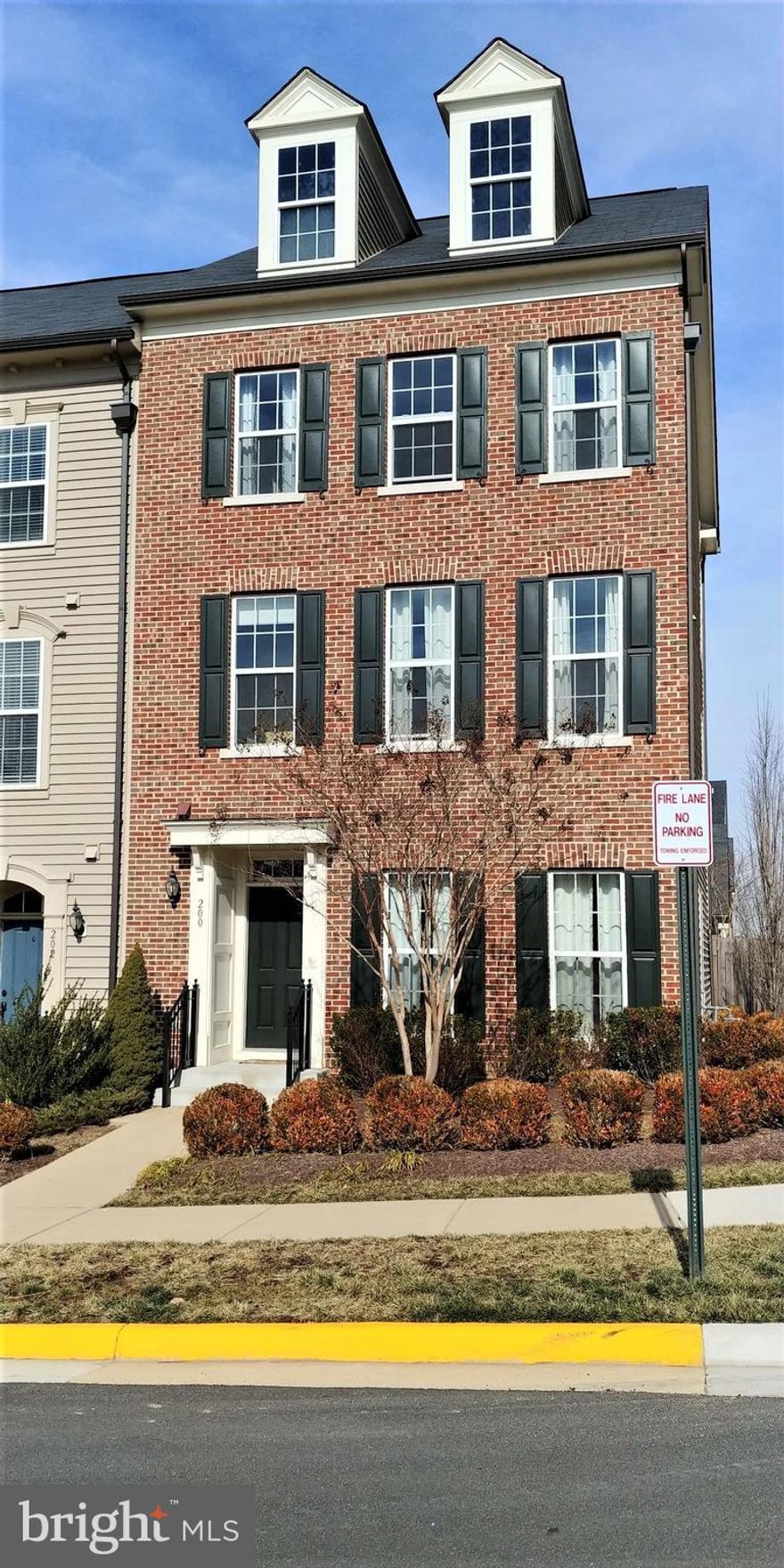 Former model home! All the bells and whistles! Spacious and light filled kitchen with granite and huge island. Built-in white cabinetry for your china and special items. Kitchen flows into the living room with hardwood flooring, open floorplan. Third level is all master bedroom, with sitting area, bar with granite counter and wine fridge, huge walk-in closet and gorgeous bath! Bath has framless tiled shower with seat and double sink. Second level has 3 bedrooms! Outside you have an awesome patio that leads to your two car garage! Super location super close to 95, shopping and Quantico! Well cared for!