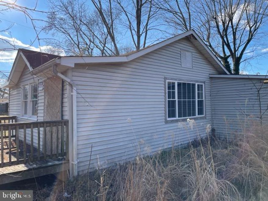 ALMOST WATERFRONT!! THE ONLY THING SEPARATING THESE WATERVIEW LOTS FROM ROCK CREEK IS THE COMMUNITY BOAT LAUNCH DRIVEWAY.  NEED TO PURCHASE 1304 AND 1306 EDNA ROAD TOGETHER. 5 25' LOTS WITH PUBLIC WATER HAS 2 HOUSES AND A LARGE SHED/WORKSHOP. ALL ARE BOARDED. DO NOT ENTER!!! PERCED IN 2018. PROBABLY WILL NEED A NITROGEN SEPTIC SYSTEM. LOTS OF POSSIBILITIES. WORK OUT TH