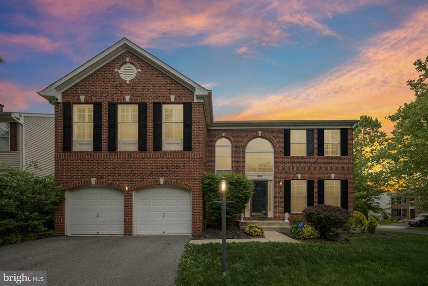 Welcome to this beautifully maintained brick-front colonial offering the perfect opportunity for buyers looking to move up into a spacious single-family home in a quiet, centrally located community in Bowie! Featuring 5 bedrooms, 3.5 bathrooms, a 2-car garage, and a lawn sprinkler system, this impressive home combines generous living spaces with timeless finishes and a layout designed for both entertaining and everyday comfort.

Step inside the dramatic two-story foyer and immediately appreciate the elegance of the cherry hardwood floors flowing through the formal living room and dining room. The dining room provides the perfect setting for gatherings and special occasions, while decorative crown molding throughout the living room, dining room, and family room adds a touch of sophistication.

The spacious kitchen is sure to impress with granite countertops, a lovely decorative backsplash, double ovens, pendant lighting over the center island, recessed lighting, and cherry hardwood flooring. The kitchen opens directly into the generous family room featuring a cozy fireplace, creating the ideal space for relaxing evenings or entertaining guests.

Upstairs, you’ll find four nicely sized bedrooms with hardwood flooring throughout the upper level, including an expansive primary suite featuring cathedral ceilings, decorative molding, a large walk-in closet, and a private spa-like bathroom complete with a soaking tub, separate shower, and dual vanity space.

The main level also offers convenient walkout access to a beautiful stone patio overlooking the flat, fully fenced backyard, providing the perfect outdoor setup for cookouts, gatherings, or simply enjoying your own private outdoor retreat.

The finished basement offers even more versatile living space with wood flooring throughout, a spacious rec room, additional storage space, and a beautifully designed wet bar featuring decorative stone facing and granite countertops, making it the perfect setup for entertaining. The basement also includes a guest room that can easily function as a home office or potential fifth bedroom and features its own walk-in closet.

Located in the heart of Bowie, residents enjoy convenient access to parks, walking trails, shopping centers, restaurants, entertainment, commuter routes, and nearby community amenities that make everyday living easy and enjoyable.

Property is being sold as-is.

Prefer Cardinal Title Group. Disclosures on MLS.