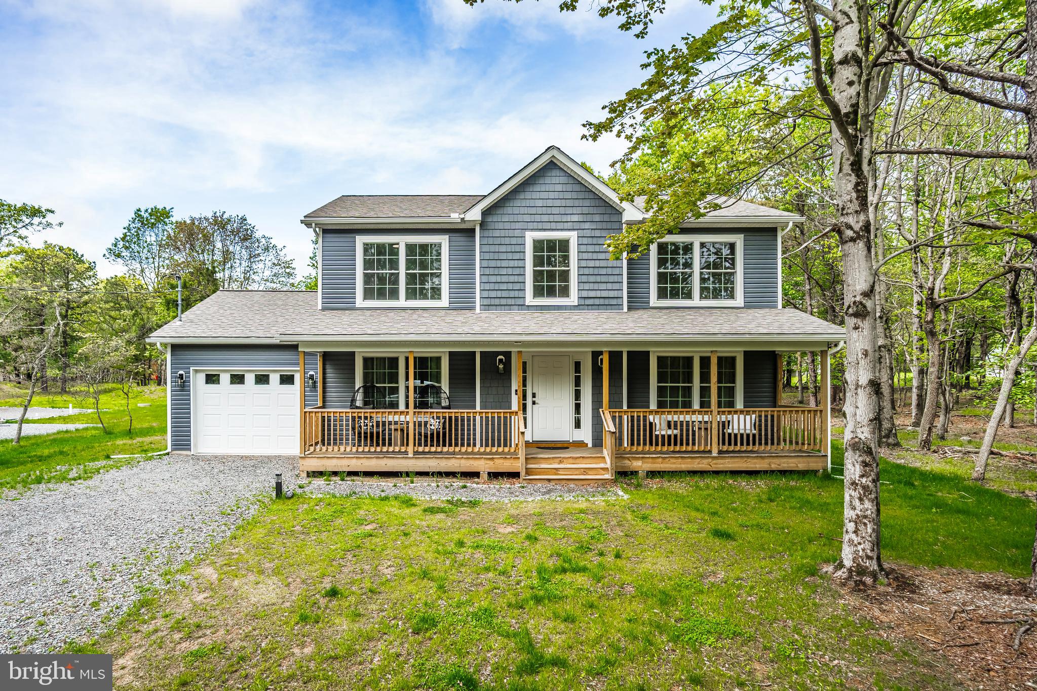 BRAND NEW BUILD - this custom designed 2 story colonial home proudly built by Swat Homes Inc offers over 2,000 square feet of finished living space within the Towamensing Trails community. This beautifully designed home features solid hardwood floors throughout, family room with propane gas fireplace, recessed lighting, and convenient first floor laundry. The gourmet kitchen is custom designed with granite countertops, stainless steel GE appliances, breakfast bar with seating for 3, convenient pantry and adjoining formal dining room. The owner's suite features a large walk-in closet and en suite bath with double vanity and shower with tile surround. Three additional bedrooms share a full bath with single vanity, linen closet,
and shower with tile surround. Outdoor highlights include a covered front porch, large rear deck, upgraded vinyl siding, vinyl double hung Simonson windows, and a 30-year warrantied roof. Forced air propane heating and cooling ensures year-round comfort. Towamensing Trails offers their homeowners countless private amenities and is a unique way to experience the best the Poconos have to offer like skiing, festivals, waterparks, shopping and so much more. Additional lots & models available. Schedule today! *PLEASE NOTE: Photos are of a previously completed Gene model. Exact style and finishings will vary.