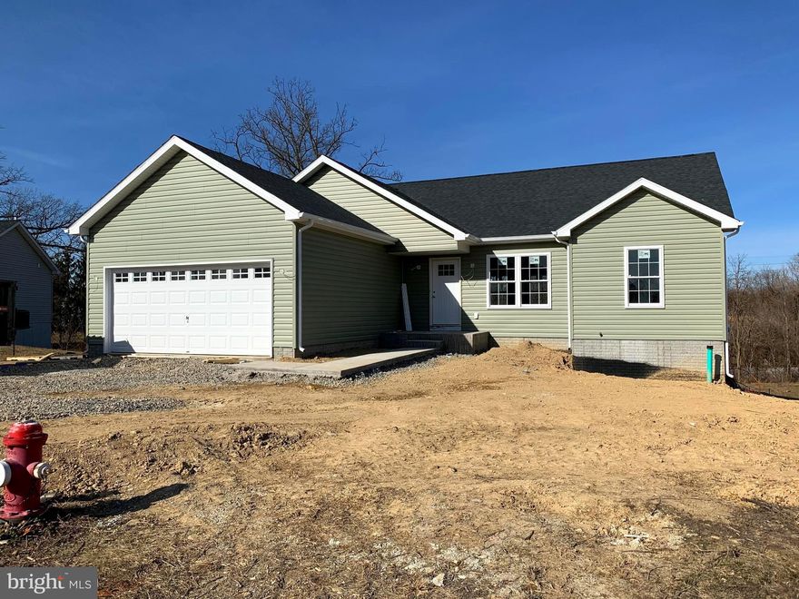 OPEN FLOOR PLAN WITH CATHEDRAL CEILING. Great Room Concept encompasses the Dining Room and Kitchen. The Split Bedroom Design offers Private Owner's Suite w/LARGE WALK IN CLOSET. Finished 2 Car Garage. Full Walkout Basement PICTURES ARE OF PREVIOUS CONSTRUCTION.