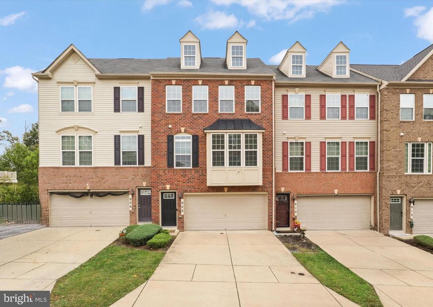 Welcome to... 908 Evers Avenue! Almost new, totally stylish, and designed for comfort, convenience, and low-maintenance living. This stunning 3-bedroom, 3.5-bath brick-front townhome offers nearly 2,800 square feet of beautifully finished space, filled with natural light and modern design throughout. The open-concept main level features hardwood floors, recessed lighting, and a seamless layout perfect for both daily living and entertaining. The gourmet kitchen is a true highlight featuring granite countertops, rich espresso cabinetry, stainless steel appliances, and two separate breakfast bars for flexible dining and conversation. Retreat upstairs to the luxurious Owner’s Suite complete with a walk-in closet and a spa-like bathroom offering dual vanities, a soaking tub, and a separate shower. You’ll also find two additional generously sized bedrooms, an additional full bath, and the ultra convenience of an upper-level laundry room. Step out to a private, low-maintenance composite deck overlooking a scenic wooded backdrop,  one of the best lots in the community. A 2-car front-load garage and a rear yard add even more to love. The walk-out basement adds incredible flexibility with a full bath, brand new carpet, and space perfect for a rec room, home gym, or even a fourth bedroom. Energy-efficient features include a tankless water heater and modern systems designed for sustainability and savings. Located in The Park at Addison Metro, a charming and well-kept community with a low HOA that includes lawn care (that’s right, they cut your lawn FOR YOU)! Commuters will appreciate the unbeatable location just minutes to three Metro stations, I-295, I-495, downtown DC, Northern Virginia, and Andrews AFB. You’re also just a short walk to Rollins Avenue Park — a local gem offering space for all to play, relax, and connect with nature. 908 Evers Avenue checks every box, and then some. Come experience modern living with everyday ease and timeless style.