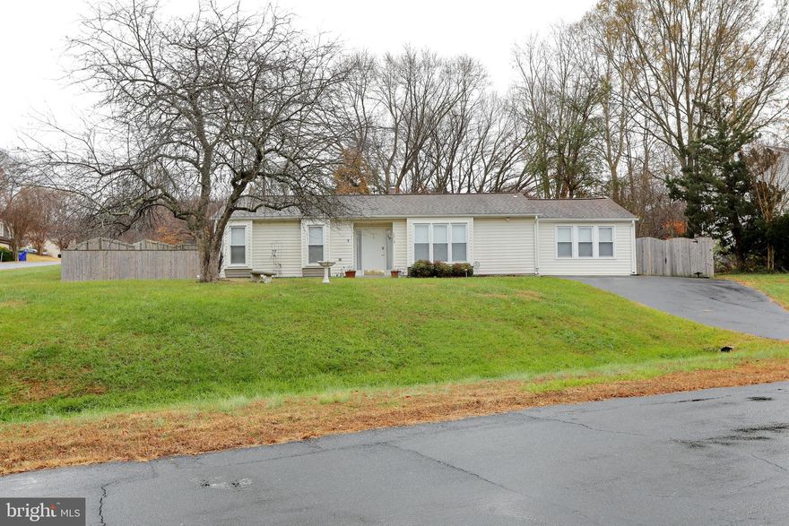 Welcome to the tranquility of first-floor living in a peaceful and well-established neighborhood just on the outskirts of Waldorf! Nestled on a corner lot, this home offers not only the comfort of single-story living but also the allure of a spacious fenced backyard, perfect for relaxation and recreation. Prepare to be charmed as you explore the possibilities of this residence.
Step into a kitchen that has been tastefully remodeled with cherry cabinets, stainless steel appliances, and elegant granite countertops, creating a space that is both functional and stylish. The bathroom has also been given a modern touch, and in 2023, the HVAC system underwent a complete upgrade, ensuring year-round comfort and efficiency. Also, the sellers had two rooms painted and installed new carpeting with in the last 2 weeks. This home awaits your personal touch, allowing you to make this house truly feel like home. While a bit of tender loving care (TLC) is needed, it presents the perfect canvas for you to infuse your own style and character. The large family room is inviting, only steps to an oversized deck and boasts a wood burning fireplace.  Convenience is key with easy commuter routes into DC, VA, and local military bases. Additionally, this home is just a few miles away from an array of amenities including restaurants, schools, parks, and shopping centers. Experience the best of both worlds – a serene retreat in a quiet neighborhood and quick access to the vibrancy of city life.