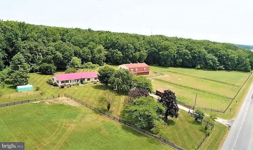 Country peace full setting. The barn has 10 stalls, tack room, and wash down stall. Huge hay loft with elevator. Multiple pastures with run in sheds. The apartment has a open floor plan that was just freshly painted with new flooring. Owner lives in house and says laundry machines in garage can be used by tenant. So if you have horses or farm animals this rental is for you. Gardening area to grow fresh vegetables. You could raise all your food on this farmette. Owner motivated so price can be negotiated.