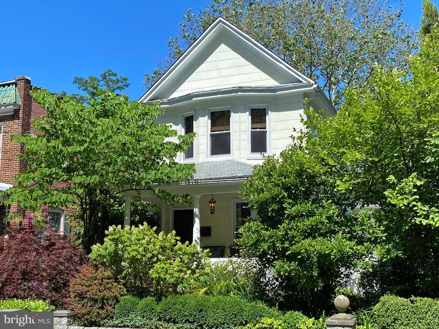 https://youtu.be/W4LYYSJvBYQ  Quintessential Roland Park/Evergreen Victorian with detached Carriage House! 2 bedrooms on the upper level and a finished basement/3rd bedroom in the basement. Gorgeous interior living space plus a detached, beautifully finished office, artist retreat or yoga studio with climate control and parking space. Step up to your inviting, pillared front porch or meander down the reclaimed stone walkway through the lush, carefully curated mature gardens with rare, vintage & traditional perennials, flowering shrubs and shade trees. Relax on your stone patio next to the fieldstone fish pond & fountain. If you feel a sprinkle, duck under the covered rear 2nd stone patio, or take the staircase up to your screened, covered deck off the kitchen. Inside you'll find many original details including gorgeous hardwood floors, moldings, staircase, oversized windows and more. The main level includes a living room with working gas fireplace, oversized dining room with chandelier and lots of natural light and an updated kitchen with unique 5 pane oversized sink window looking out onto the deck. The upper level includes 2 large bedrooms and a full bath plus pull-down attic stairs for additional storage space.  The lower level is beautifully finished with a full bath and was used as a 3rd bedroom with sitting area or can be a large family room with walk out to the side of the home. Or continue back through the basement to the finished laundry room and mudroom with rear walkout door. Did I mention the detached cedar shake Carriage House? 24' x 11.5' beautifully finished office or studio with skylights, built-in cabinets, chandelier, sink, and radiant heat tile flooring plus heat & A/C. Nestled on a quite street just 2 blocks from Restaurants, Coffee Shops and Stoney Run Walking Path, it s also just minutes from I-83, JHU, Roland Park Shopping District and the Avenue in Hampden.  The homes in this neighborhood are a rare find so make your appointment today. This is Short Sale. This is being professionally negotiated by Emerald Bay Escrow & Law Offices of Sofya Pokov, LLC . This home is in great condition but is being sold AS IS. Seller's will make no repairs.
