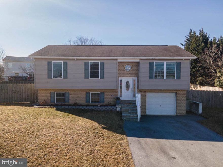 Welcome Home to Naudenbuche Heights, this split-level home will not last long! This home features a bright and sunny living room/ kitchen with hardwood floors.  Recently updated kitchen with new granite counters, new sink and many more touches that are sure to impress. Large master bath with private bath and walk-in closet.  Plenty of room for outside entertaining with the deck off the dining room that overlooks the spacious fenced in yard.  One car garage with large driveway.  Easily finish off the basement for additional space. With so much to offer..this home is a STEAL!