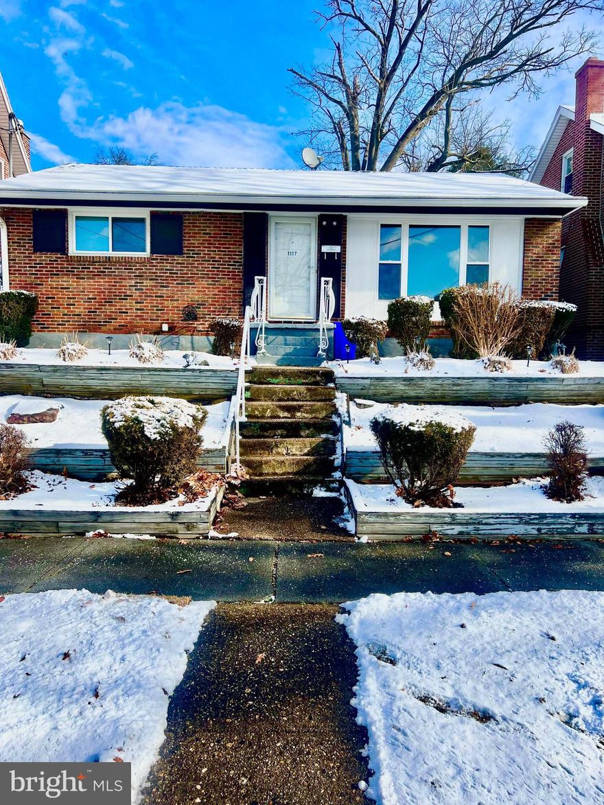 Beautiful  brick ranch home with open floor plan, Gorgeous updated kitchen,Off street parking w room  for 4 cars! Deck w covered hot tub, fenced in yard, hardwood floors thru out Updated bathrooms on main and lower levels with ceramic tile, vanities and fixtures, Partially finished lower level has a rec area or family room with a 3rd private bedroom. All appliances stay! See it today and make it your new home tomorrow!