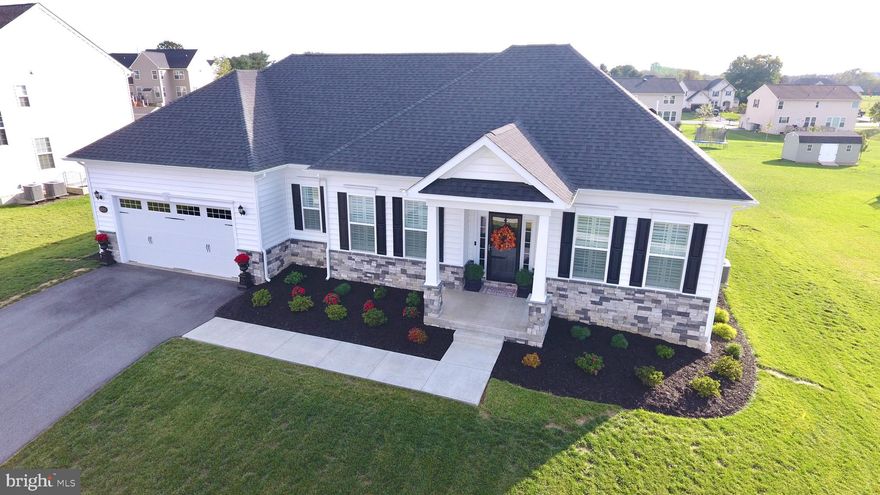 Absolutely stunning Weston Floorplan offering one level living, 1880+ sq ft of living space, 3 Bedrooms, 2 Full baths and high end finishes including beautiful plantation shutters throughout home! Entering through the foyer, you will find hardwood flooring throughout the Formal Dining Room with tray ceiling, Family Room with custom built-ins, Gourmet Kitchen with marble counter tops, raised panel cabinetry, breakfast bar, and slate appliances. The right wing Primary Owner's Suite with over sized walk in closet has a luxury bath complete with frameless shower door and custom bench seat and built in shelf! On the left wing of the home are the two additional bedrooms with upgraded carpet and a shared full bath with tile and double sink. Full unfinished basement is ready for you to make your own with walk out stairs to the outside yard. Gorgeous rear covered patio area perfect for enjoying a peaceful evening at home. 2 car attached garage with expanded garage door and laundry tub.  This LIKE NEW home is truly a must see! ** HOME INSPECTOR/APPRAISER - PLEASE SCHEDULE THROUGH SHOWING TIME ONLINE***