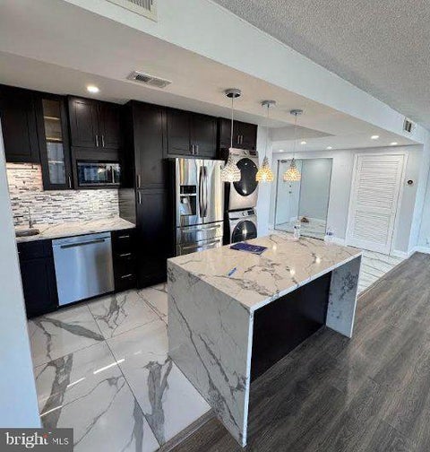 Photo of 6301 Stevenson Avenue #801, ALEXANDRIA, VA 22304 (MLS # VAAX2067884)