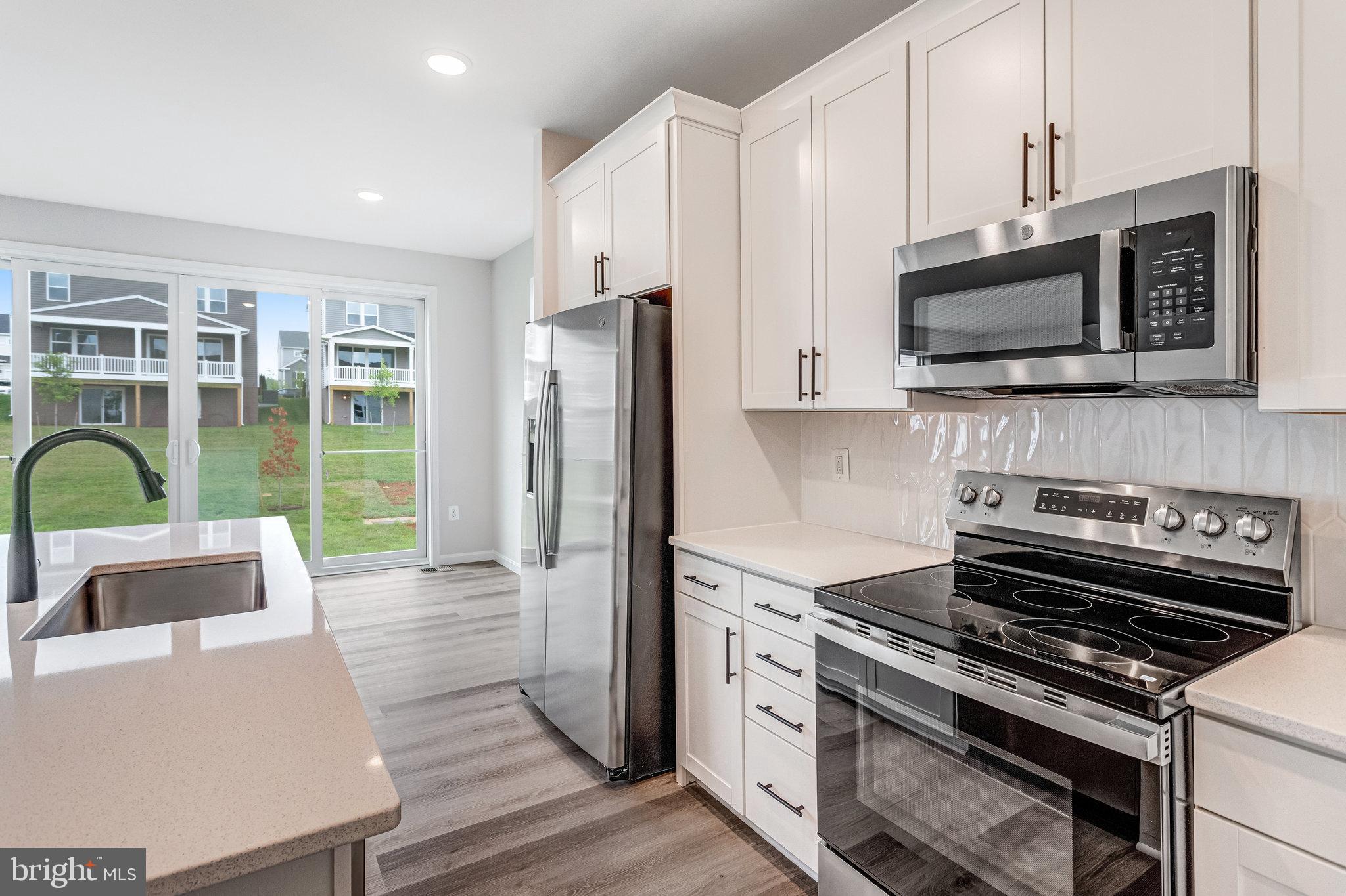 SEASONS AT ROUND MILL MEADOWS - Residential