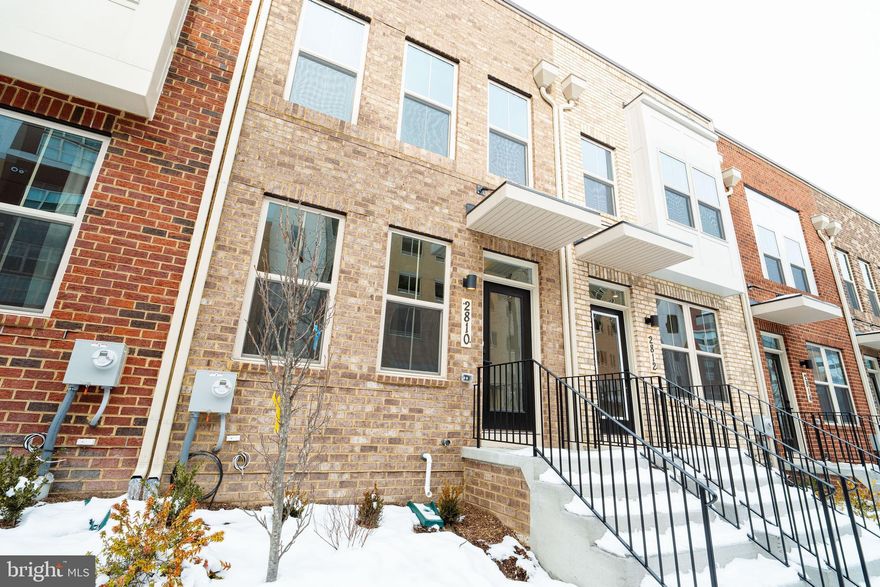 4 LEVEL WITH ROOFTOP TERRACE CLARENDON. A recently Ryan Home new construction  in the heart of the Belcrest area, this a  Clarendon townhome is where convenience meets luxury. On the lower level, a 2-Car Tandem Garage. Ascend to the main level where a gourmet kitchen creates a sense of warmth and unity. The adjoining dining and family rooms are perfect for entertaining. The third level features 2 bedrooms and 2 full baths. The lavish owner's suite features a dual vanity and a gigantic walk-in closet. This home features a rooftop terrace and a third bedroom with a full bath. Come see all that The Clarendon has to offer; all in a walkable community with easy access to the Metro; shopping and more; and only 3 miles to DC.