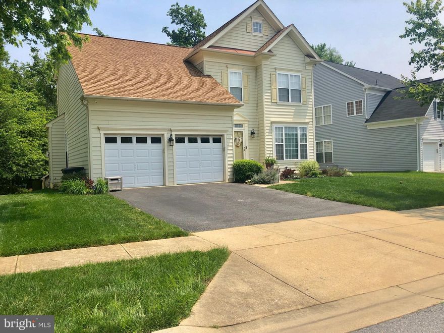 Beautifully updated 4 bedroom 2.5 bath single family home with gleaming hardwood floors, gourmet kitchen, great floorplan with spacious bedrooms, cozy family room w/ fireplace, large finished basement, two car garage, lovely private deck and patio, all tucked away in the Willow Creek community. Shopping and dining nearby!