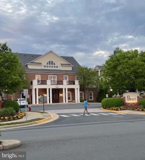 Photo of 12941 Centre Park Circle #116, HERNDON, VA 20171 (MLS # VAFX2332038)