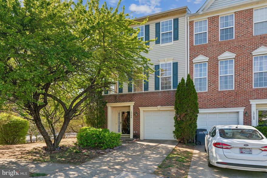 Spring into this stunning end-unit townhome in the sought-after Markhams Grant Community!

Offering over 2,600 square feet across three beautifully finished levels, this sun-filled 3-bedroom, 2 full and 2 half bath home has been freshly painted throughout and is move-in ready.

As you enter through the front door, you're greeted by a spacious foyer that opens into a cozy family room—perfect for relaxing or gathering with guests. This lower level also provides access to the private, tree-lined backyard, offering a peaceful setting with added privacy.

Upstairs, the second level shines with gleaming hardwood floors and a bright, open layout. The L-shaped kitchen features stainless steel appliances, granite countertops, a matching backsplash, and light wood cabinetry offering ample storage. The adjoining dining area opens onto a private deck—perfect for morning coffee or evening entertaining.

The upper-level hosts three generously sized bedrooms, including the owner’s suite with a walk-in closet and a spa-like en-suite bath featuring dual sinks, a soaking tub, and a separate shower.

Additional highlights include a one-car garage, driveway parking, and convenient access to nearby amenities, commuter routes, and more.

Don’t miss the opportunity to make this beautiful home in Markhams Grant your own!