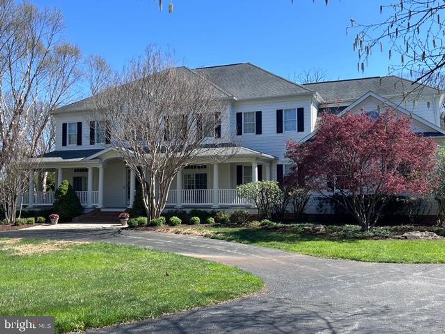 **Stunning Southern Colonial in Braeside: Your Dream Home Awaits!**

Welcome to the desirable enclave of Braeside, where this 5-bedroom, 4 full and 2 half-bathroom Southern Colonial residence invites you to experience “the good life” living on a beautifully landscaped 1.4 acres. Nestled within a charming 15-home community, this property boasts an inviting wrap-around porch, setting the stage for warmth and hospitality.

The moment you step through the entryway you will be greeted by a sense of home. The main floor features beautiful hardwood flooring, soaring high ceilings, and spacious rooms bathed in natural light. The living room and formal dining room flank a grand 2-story foyer, perfect for both entertaining and everyday living. A butler’s pantry, equipped with a wet bar and wine fridge, seamlessly connect the dining room to the expansive chef’s kitchen. Here, culinary enthusiasts will delight in the oversized island, top-of-the-line appliances, quartz countertops, a second beverage fridge, an impressive custom range and hood, 2 wall ovens, a heavy-duty hidden mixer lift, and abundant custom cabinetry that provides storage galore.

Prepare to be wowed as you enter the two-story family/great room, featuring stunning custom woodworking, magnificent floor-to-ceiling windows, and a stately wood-burning fireplace that serves as a striking focal point, complemented by built-in window seats perfect for adding more people to casual or important conversations. Rounding out the main level, you’ll find a generously sized private office, two convenient half-baths, and a spacious utility/laundry room complete with a second refrigerator and additional storage.

Venture upstairs via your choice of the grand staircase or the rear stairs leading from the kitchen. The expansive primary suite promises relaxation, boasting a cozy sitting area with gas fireplace and there are dual walk-in closets. The en-suite bathroom features a double vanity, a luxurious soaking tub, and a dedicated shower for a serene retreat. On the other side of the 2nd floor, bedroom 2 offers its own private en-suite bathroom, while bedrooms 3 and 4 share a thoughtfully designed en-suite bathroom, providing comfort and privacy for family and guests alike.

The lower level enhances the home's versatility with a spacious recreation room, a dedicated home gym, a fifth bedroom, a full bathroom, and an oversized utility storage room, including a wine storage closet for the connoisseurs at heart. A three-car attached garage ensures ample space for protecting vehicles and gear.

Now, let’s talk about entertaining! Step outside to the expansive covered rear veranda, perfect for alfresco dining, lounging, sipping, lallygagging or simply soaking in the beauty of your surroundings. The heated pool serves as the centerpiece for summer gatherings, where friends and family can create memories that last a lifetime.

All of this is conveniently located just far enough from the hustle and bustle while being mere moments away from grocery stores, wine shops, charming cafes, delightful restaurants, coffee shops, and more. Experience the perfect blend of tranquility and accessibility.

Welcome home—where your dream lifestyle awaits! Reach out today to schedule your private tour!