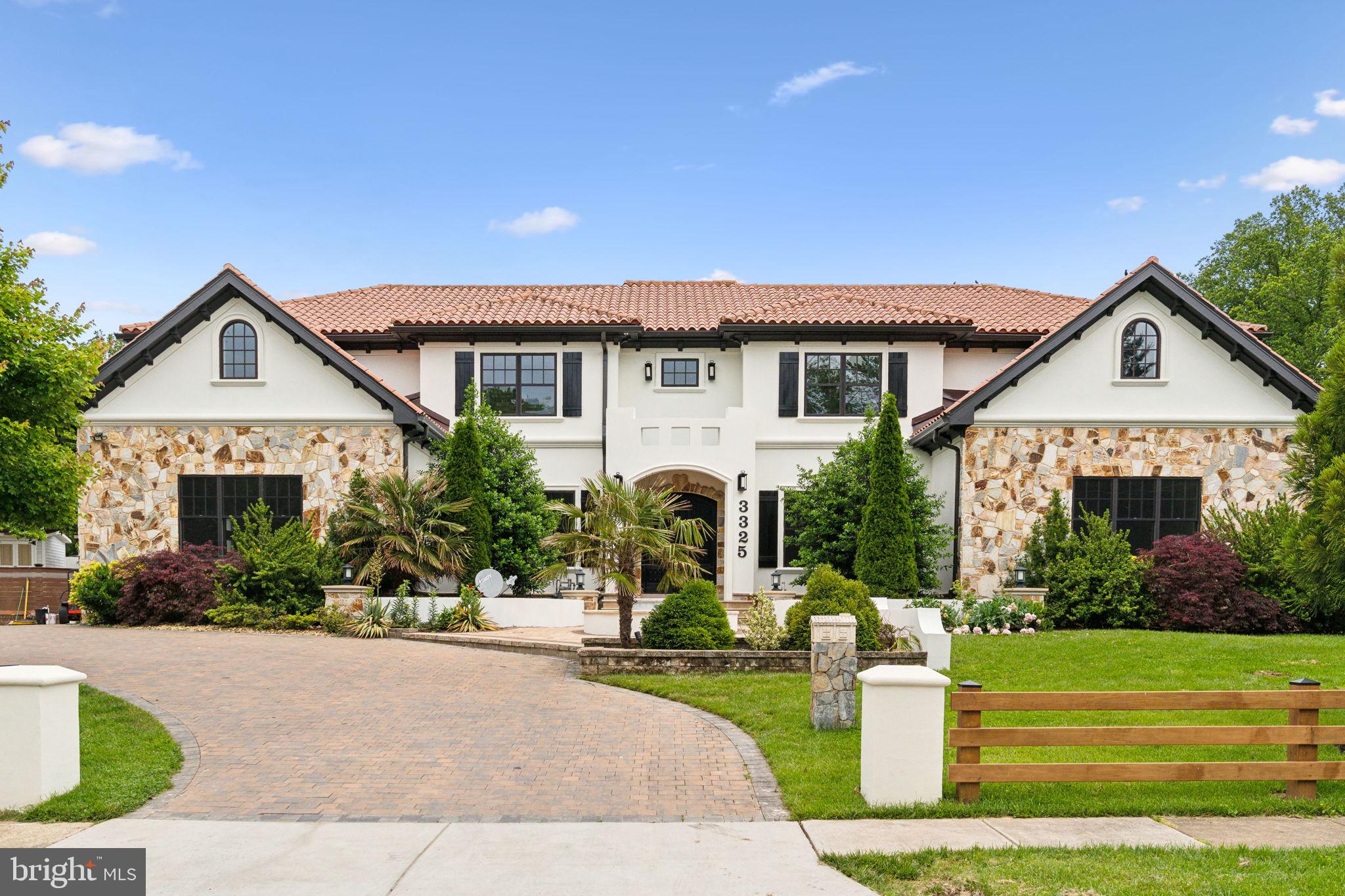Welcome to this like new custom home on a large lot, built by a local custom builder, as his own residence in 2017 with exceptional quality and materials. Welcome to this like-new custom Mediterranean-style home, originally built in 2017 by Merit Homes as the builder’s personal residence and recently updated with fresh paint, new bathroom cabinets, lighting, and countertops to give it a refreshed, modern feel. Set on a large lot, this thoughtfully designed home features a clay tile roof, stucco exterior with stone accents, 6 bedrooms, 5 full and 1 half bathrooms, 2 fireplaces, 2 offices, and a 3-car heated garage. Expansive wraparound balconies on the main and upper levels are crafted with weather-resistant Tiger wood panels, glass railings, ceiling fans, and durable Epay wood flooring known for its 75+ year lifespan. The backyard is a private retreat with a heated pool and cascading waterfall, jacuzzi, pool house, outdoor shower, built-in kitchen, stone patio, and automatic sprinkler system. Inside, the main level offers a marble-floored foyer, formal dining room, living room with built-ins, a guest bedroom suite, an office, and a family room with cathedral ceiling and fireplace, seamlessly flowing into a gourmet kitchen with Wolf/Sub-Zero appliances, new quartz countertops, and an oversized island. Upstairs, the spacious primary suite includes two walk-in closets, a sitting area with fireplace, a large covered balcony, and a luxurious bath with a steam shower, jacuzzi tub, and heated floors. The home includes two laundry rooms—one fully equipped on the upper level and another on the lower level (washer/dryer on lower level not included). The finished lower level also features a bedroom with full bath, office with built-ins, and a recreation room with wet bar, offering comfort, style, and functionality throughout this exceptional residence.