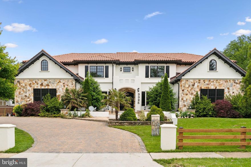 Welcome to this  like new  custom home on a large lot,  built by a local custom builder,  as his own residence   in 2017 with exceptional quality and materials.  Welcome to this like-new custom Mediterranean-style home, originally built in 2017 by Merit Homes as the builder’s personal residence and recently updated with fresh paint, new bathroom cabinets, lighting, and countertops to give it a refreshed, modern feel. Set on a large lot, this thoughtfully designed home features a clay tile roof, stucco exterior with stone accents, 6 bedrooms, 5 full and 1 half bathrooms, 2 fireplaces, 2 offices, and a 3-car heated garage. Expansive wraparound balconies on the main and upper levels are crafted with weather-resistant Tiger wood panels, glass railings, ceiling fans, and durable Epay wood flooring known for its 75+ year lifespan. The backyard is a private retreat with a heated pool and cascading waterfall, jacuzzi, pool house, outdoor shower, built-in kitchen, stone patio, and automatic sprinkler system. Inside, the main level offers a marble-floored foyer, formal dining room, living room with built-ins, a guest bedroom suite, an office, and a family room with cathedral ceiling and fireplace, seamlessly flowing into a gourmet kitchen with Wolf/Sub-Zero appliances, new quartz countertops, and an oversized island. Upstairs, the spacious primary suite includes two walk-in closets, a sitting area with fireplace, a large covered balcony, and a luxurious bath with a steam shower, jacuzzi tub, and heated floors. The home includes two laundry rooms—one fully equipped on the upper level and another on the lower level (washer/dryer on lower level not included). The finished lower level also features a bedroom with full bath, office with built-ins, and a recreation room with wet bar, offering comfort, style, and functionality throughout this exceptional residence.