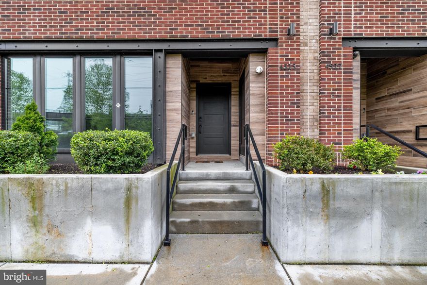 Welcome to 4525 Riverside Way, a stunning 4-bedroom, 3.5-bathroom home nestled in the heart of Manayunk in The Locks Development. This modern masterpiece, just three years young, boasts high-end finishes throughout and offers seven years remaining on its tax abatement. This unique home is one of only a handful in the development which has unobstructed views of both the canal and river. As you step inside, you're greeted by a versatile first floor that can be transformed into an additional living area or tailored to suit your needs. Here you will find access to the 2 car garage, storage closet and convenient 5-stop elevator. Ascend to the second floor where you will be captivated by the allure of the expansive living area and kitchen. Here, the living area unfolds into a masterpiece of design, boasting not only ample space for lounging and entertaining but also a gourmet kitchen that's sure to inspire culinary creativity. Picture yourself hosting gatherings, where seating for four invites lively conversations over hors d'oeuvres and cocktails. Adjacent to the kitchen, discover a flex space that beckons with the promise of endless possibilities and river views. Here, a stylish bar complete with a beverage refrigerator stands ready to elevate your hosting game to new heights. Whether you envision a cozy coffee nook for morning brews or a chic cocktail lounge for evening soirees, this versatile area offers the perfect canvas for your imagination to run wild. Venture to the third floor to discover three bedrooms and two bathrooms, thoughtfully designed to provide comfort and functionality. The fourth floor is dedicated to luxury living, housing the primary suite that spans the entire floor. This sanctuary boasts a private terrace, wet bar, sitting room or office space, and walk-in closets, offering the ultimate retreat. Boasting timeless elegance, the primary bathroom features a dual vanity for convenience and style. Pamper yourself in the glass-enclosed shower, or indulge in a leisurely soak in the sleek tub overlooking the river. Every detail has been meticulously crafted to create a space that exudes sophistication and relaxation. Step onto the fifth floor to find the crowning jewel of this home - the rooftop deck. With breathtaking views of the surrounding area, this outdoor space is perfect for enjoying warm summer evenings or hosting gatherings with friends and family. Conveniently located in Manayunk, this home offers easy access to a myriad of dining, shopping, and entertainment options along Main Street. Don't miss the opportunity to make 4525 Riverside Way your own and experience upscale living at its finest.