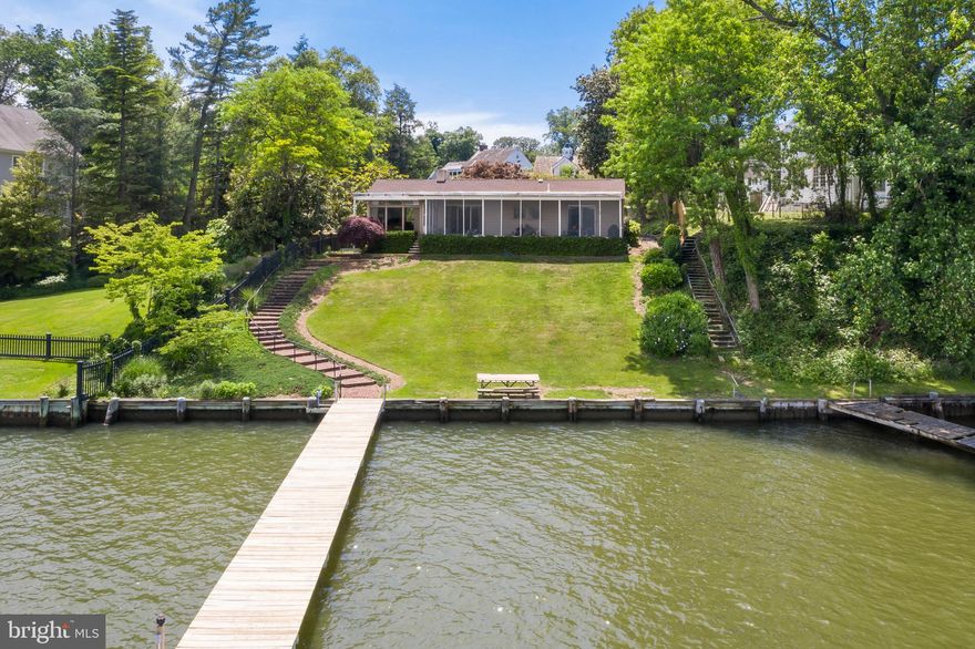 Severn River Waterfront home in a lovely, established community of Wardour. Close enough you can walk to town or simply go by water in your boat or jet ski to City Dock. Designed by well known Annapolis architect, Charlie Lamb, the house was built in 1952. Lots of personality, vaulted ceilings, stone fireplace with history (non-functioning), lovely wood floors, irresistible large, screened porch, and expansive Severn River water views. Three bedrooms and two full bathrooms, carport and plenty of additional off street parking. Wonderful opportunity to live the Annapolis Waterfront Lifestyle! Stone revetment to be completed by Norris, scheduled for end of summer.
