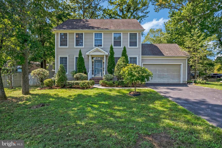 **Motivated Sellers!** Great price improvement on this beautiful home located in LOCH HAVEN! Bright and spacious 4 bedroom/2.5 bath home located in the water privileged community of Loch Haven in Edgewater.  This home offers an attached two car garage, hardwood flooring, SS appliances, open concept kitchen-living area and large deck off of the kitchen into the private and serene backyard.  Freshly painted throughout, refinished hardwood floors, and all new carpeting on the upper level.   It is move in ready & picture perfect!  Expansive full basement perfect for additional storage if needed or to complete the space yourself with your own design!  Walking distance to all community amenities which include a baseball field, basketball, volleyball and tennis courts, sandy beach with netted swimming area, private community only marina, playgrounds and more!  Come see for yourself what a great home this is and MAKE AN OFFER!  Excellent location for commuting with easy access to Rt 50 and 97, tons of  shopping options, restaurants, doctors/medical needs, the Edgewater library and South River schools!