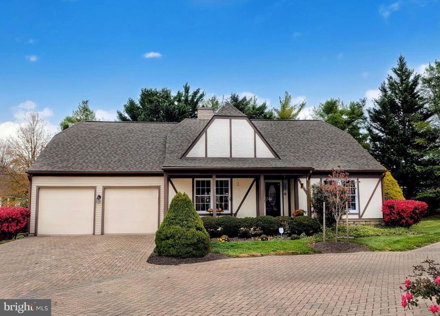 Welcome to 820 Dunbrooke Ct, a beautifully updated 3-bedroom, 2-bath home tucked away in a tranquil court setting in the heart of popular Worman's Mill. The show stopping designer kitchen features stylish upgrades like large four seater island, neutral quartz counters, glass display cabinetry, integrated bar area with beverage center, and upgraded stainless steel appliances including a gas cooktop with custom range hood. A cozy dining nook to the rear is the perfect setting for casual meals or morning coffee. Through a set of double doors, the open concept living and dining rooms provide the perfect balance of formal and every day entertaining possibilities with wide open sightlines, and are enhanced by angled tray ceilings, custom lighting, and special touches like the ember glow fireplace. Through a set of glass French doors the sunroom (currently used as a music/piano room) provides the perfect transition to outdoor spaces, including the composite deck ready for grilling out or bird watching with coffee. Your primary suite includes a generous walk-in closet and a stylish remodeled bathroom with jetted tub, walk-in shower, and dual vanity with lighted and heated vanity mirrors. Other standout features throughout this special home include upgraded lighting, easy operation lever handles, and rich character plank flooring--no carpet! Set against a backdrop of a landscaped privacy berm with shrubs and mature evergreens, this home offers rare backyard privacy and a very peaceful atmosphere. Parking is a breeze with a two-car garage--and space for 3-4 more vehicles in the private brick driveway--and is complete with an EV charger. Best of all, this home is located a short in-neighborhood distance to Worman's Mills vibrant village center, where you'll find popular restaurants like Ricci and Plaza Mexico, other shops, and entertainment, plus the convenience of local-fave Wegmans grocery store less than 5 minutes away. Enjoy the perfect blend of upgraded comfort, single-level living, community amenities and location