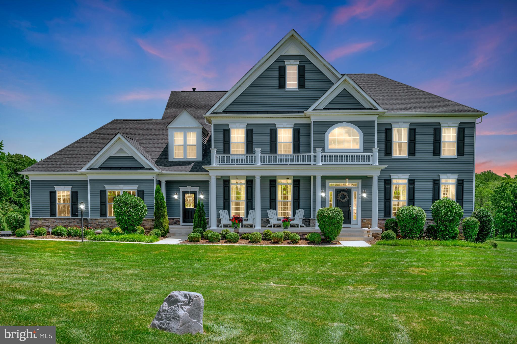 Located inside the prestigious Monroe Estates Community, this elegant 6,719 fully finished square feet custom built Augustine Dream Home captures a classic beautiful and relaxed southern living style from every angle. This immaculate home offers a flawless balance of relaxed indoor and outdoor living, everyday comfort, is sited on a spacious 3-acre cul-de-sac lot surrounded by rolling hills and tranquil privacy! Once you enter this eloquent 5 bedroom, 4.5 bath home from the columned front porch into the two story foyer with high grade luxury vinyl plank flooring and five inch molding, you will appreciate the exquisite marksmanship and detail. The formal dining room offers the perfect setting for special functions and celebrations. The adjacent living room is ideal for gathering and lounging in style as it adorns masterfully designed molding with floor to ceiling windows adding to its glamour. Passing from the foyer through the archway to the spectacular family room with additional decorative columns, decorative molding in a grid designed trey ceiling, a gas fireplace anchored by large windows affording incredible views of nature and the luxury pool area built for entertaining and relaxation. The family room is located between two stairways that lead to the second floor, one of which is off the gourmet kitchen that contains beautiful custom cabinetry, stainless steel appliances, built-in double wall oven, built-in microwave, an extended island with breakfast bar seating that contains a quartz countertop to match the kitchen countertops, subway tile backsplash and a separate breakfast style area. The area directly off the kitchen contains a coffee bar/butler’s pantry, a spacious walk-in pantry, and a mud room area with its own entrance from the outside. As you walk toward the second staircase to the second floor, you will pass the built-in desk area before reaching the half bath and the private office/library located to the left through French doors. Ten foot ceilings enclose the first floor and nine foot ceilings enclose the 2nd floor with crown molding lacing the hallway. The very luxurious and spacious main suite includes the main bedroom with an additional sitting room area with large windows inviting warm natural sunlight, providing a cozy spot for reading. Also included in the main suite is a lavish bathroom containing dual vanities, a soaking tub for unwinding, and a walk-in shower, all masterfully tiled, and a fabulous large walk-in closet with a window nook. The laundry room (washer/dryer and utility sink) separates the main suite from the large second bedroom which includes a full private bathroom. Bedrooms three and four are separated by the balcony/landing to the right of the home which share a Jack and Jill style bathroom including a double sink vanity with a private toilet and bath. The basement has a large recreational room which provides versatility concerning entertainment options with a built in wet bar (12 foot and 6 foot granite counter top) that includes a dishwasher, cabinets, sink and an additional refrigerator; a fifth bedroom with a fourth full bathroom, a movie/theater room, and a small unfinished area that serves as a storage, utility and exercise room. The basement walkout leads to an expansive decorative stamped concrete patio and IN GROUND, HEATED, SALTWATER, ROMAN STYLE POOL with added trees for privacy that has lots of sun by day and shaded in the evenings perfect for gatherings. The home also includes an extended two car garage, a wide driveway allowing for plenty of parking, and a lawn sprinkler system. Do not miss out on this luxury home located far enough away for solitude and tranquility, but with quick access to shopping, restaurants, commuter lot, and Interstate 95. EXPECTED "ACTIVE: DATE IS ON OR BEFORE JULY 17th. Showing requirements can be located in “AGENTS NOTES.”