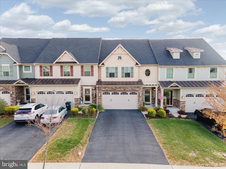 This gorgeous 3-level Patio Home is in the community of Brunswick Crossing and has over 4,000 sq. ft. of finished living space and a 2-car garage. Real Estate is all about LOCATION … LOCATION … LOCATION and 1262 Drydock Street will not disappoint, as it has privacy in the rear with views of mountains! Whether you are looking out the main level living room & owner’s bedroom windows or off the rear composite deck, you will love the scenic setting. The entry foyer is impressive with its 9’ ceiling, hardwood floors, open stair railing to the second floor with wrought iron turned balusters with painted risers and stained oak treads. The kitchen, dining area and living room connect, leading to a vaulted ceiling and a rear window wall to bring the outside in. Off the living room is a composite deck with a seasonal awning cover and a circular staircase leading to the private pavered patio below. Stained hardwood flooring covers the entire main level. The gourmet kitchen features granite counter tops, stainless steel appliances, breakfast bar, gas stove and pantry.   The owner’s bedroom is also conveniently located on the main level with a large walk-in closet. The owner’s bathroom features a tiled walk-in dual head shower with built-in seat and a double-bowl vanity. The second floor has 2 spacious bedrooms, a full bath, a private home office and a large 19'- 5" x 13'- 5" loft with open railings between two arched openings, that overlook the main level living room. The basement level walks out on grade with plenty of natural light and has 1,400 sq. ft, of finished living space. This level has a 16’- 9” x 14’- 2” family room, a game area that is 24’- 9” x 13’-0”, plus a 18’-6” x 12’-4” bar area with double-bowl sink, an undercabinet refrigerator, cabinets and a granite countertop. This level also offers a full bathroom and a 14’-3” x 12’-0” bonus room with closets. The Owner’s have taken exceptional care of their home and it shows throughout. Brunswick Crossing offers exceptional amenities in a pleasant setting.