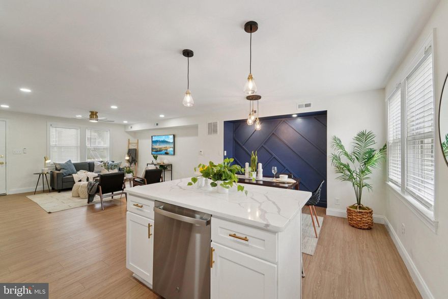 Welcome to this Beautifully Updated 3-Bedroom, 2-Bathroom home in Baltimore City’s Edmondson neighborhood! Thoughtfully Redesigned from top to bottom, this property features Modern Updates and Stylish Finishes throughout. Step inside to find Luxury Vinyl Plank Flooring, a striking Accent Wall, and an open concept Layout. The kitchen is a true highlight with White Shaker Cabinets, Gold Hardware, Brand-New Stainless Steel Appliances, and Modern Finishes—perfect for Everyday Living or Entertaining. Both bathrooms have been updated with Contemporary Design. Finished basement with walkout gives additional space to entertain or just relax. Stay comfortable year-round with Forced Air Heating and Cooling in Every Room. Outside, relax or host gatherings on your Brand-New Deck. On street parking or private parking in the backyard. This Move-In-Ready Home offers the perfect blend of Style, Comfort, and Convenience in the heart of Baltimore City.