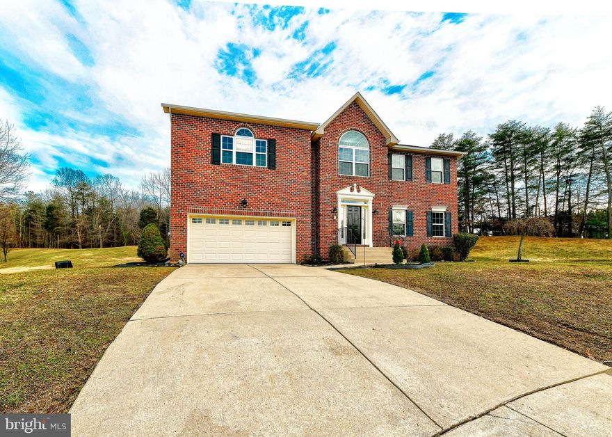 Beautiful brick front colonial on quiet cul-de-sac. House features fresh paint, new carpet, wood flooring. Formal dining & living room, cozy family room w/fireplace. Spacious kitchen w/island & table space. Large master suite w/soaking tub, separate shower & double vanities. Finished basement with full bath. Rear deck backs to. Convenient  location near  Andrews base. Easy access to DC and National Harbor.