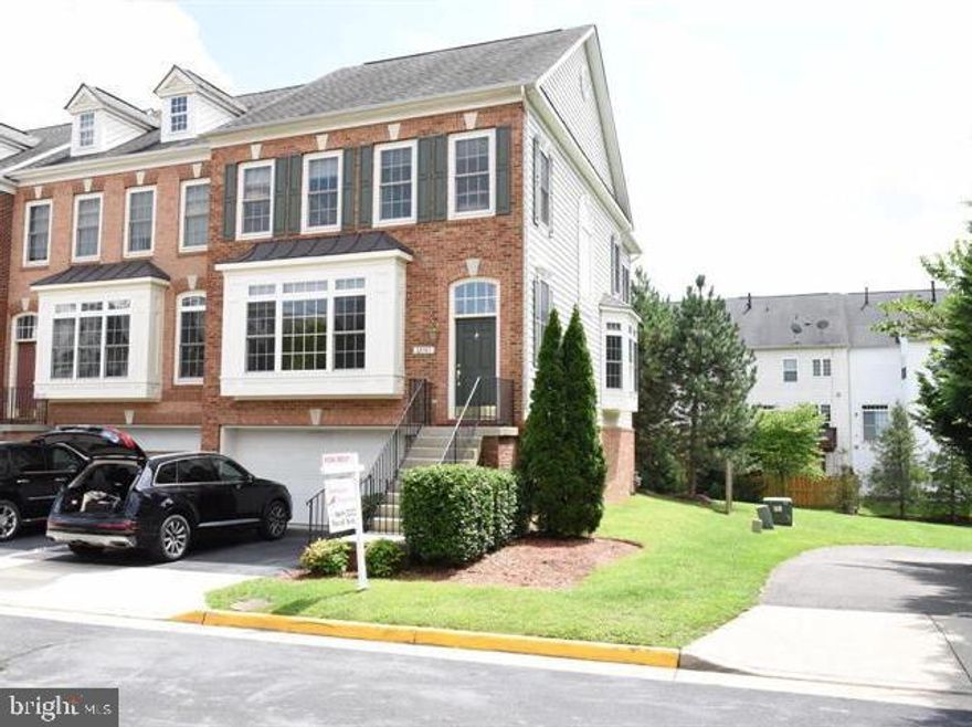 Beautifully maintained end-unit brick townhome with stunning views. Hardwood throughout the main level. Full bathroom in the basement. Spacious with 3 3-level rear bumpout and deck. This unit has stainless steel appliances and granite countertops. Move-in ready. This will not last long!!!!! (Photos were taken before current tenants moved in). NO PET allowed (no exception). Repair deductible $100