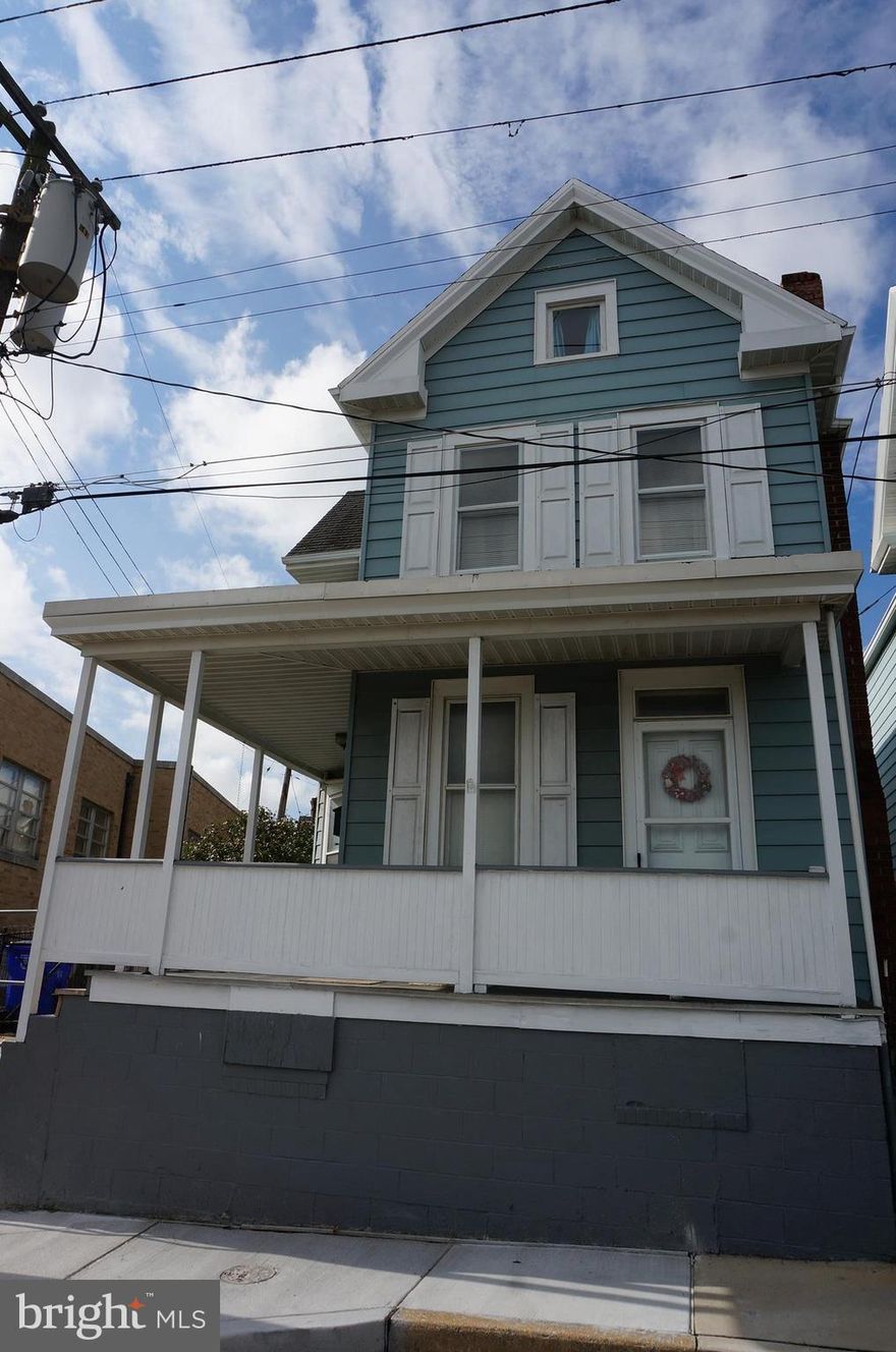 Why Rent When You Can Own! Add Your Sweat Equity To Update This 3 Bedroom 1 Bath 2 Story With Living Room, Dining Room, Eat-In Kitchen & Walk Up Attic For Storage, Wrap Around Porch, Rear Porch, Upper Rear Porch Off 3rd Bedroom. Great Fenced Rear & Side Yard. Detached 1 Car Garage With Alley Access, Being Sold AS IS. Wood Burning Fireplace In Living Room - Not Used - Decorative Only