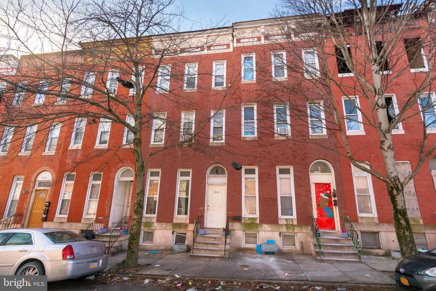 INCREDIBLE INVESTMENT OPPORTUNITY! LARGE 3 LEVEL ROWHOME THAT HAS BEEN USED AS A ROOMING HOUSE BRINGING IN $3,900/MO IN INCOME! Main level has 2 bedrooms, 1 full bath, and a kitchen. 2nd level also has 2 bedrooms, 1 full bath, and a kitchen. 3rd level has 3 additional bedrooms and the basement is partially finished with an additional bedroom. Monthly expenses are approximately $750-$800/mo. Property needs work but is perfect for the savvy investor! Sold As-Is!