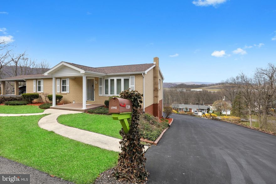 Do not miss out on this lovely brick rancher overlooking the mountains of WV  and MD. Sit outback on your 7.5 x 17 foot screened in porch or oversized deck and enjoy the panoramic views. Home offers new 40 year roof, replacement windows, 200 amp electrical service, Bath Fitter baths, Culligan water softener, main level laundry, wood stove in basement and more storage than anyone could ask for. Entire property is surrounded with Invisible Fencing. Walking distance to elementary school, 1 mile from Cumberland for convenience. HOA fee of $75/year covers snow removal, street lights and common maintenance of streets. Plenty of parking with 2 covered carport spots and 2 car garage and even more driveway space for those get-togethers. This house is truly move in ready!!