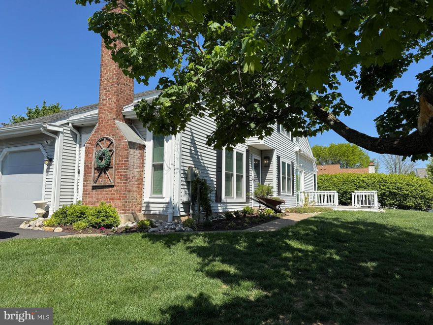 Welcome to this beautifully remodeled twin home where modern farmhouse style meets high-end finishes throughout. Thoughtfully updated from top to bottom, this move-in ready home offers 3 bedrooms plus a versatile loft/flex space with a walk-in closet, ideal for a home office, guest area, or potential 4th bedroom.  The stunning kitchen is a true showpiece, featuring Mantra cabinetry, granite countertops, custom tile backsplash, a Sub-Zero refrigerator, and LG stainless steel appliances including a slide-in glass top range, built-in microwave, and dishwasher. Additional highlights include floating shelves, a striking wood beam accent, and an instant hot/cold water dispenser with filtration. Luxury vinyl plank flooring flows seamlessly through the kitchen, breakfast area, and living room, complemented by recessed lighting throughout. Sliding glass doors lead directly to the rear deck and yard, creating the perfect indoor-outdoor living experience.  The inviting living room features a beautifully restored brick fireplace with a custom wood mantle, flanked by floor-to-ceiling windows that fill the space with natural light.  The main bedroom offers new carpeting, a spacious walk-in closet, and direct access to a spa-like bathroom complete with a double vanity and a walk-in shower featuring custom tile flooring and surround. The second bedroom also features new carpeting, and a convenient first-floor laundry/utility room completes the main level.  A staircase leads to a finished loft overlooking the living room, adding character and flexibility. The upper level also includes a bonus room or third bedroom, an additional walk-in closet, a second fully renovated spa-like bathroom, and a finished walk-in attic space for added storage.  Both full bathrooms have been beautifully updated with custom tile showers utilizing Schluter waterproofing systems, Kohler and Delta fixtures, Mantra cabinetry, granite countertops, modern lighting, and Bluetooth exhaust fans with built-in speakers.  Additional upgrades include new windows, front entry door, gutters and downspouts, a Bradford White electric hot water heater, updated switches and receptacles, custom California Closets throughout, and new carpeting in the bedrooms. The finished one-car garage features drywall and a Polyaspartic flake floor, along with attic access for additional storage.  Exterior features include an expanded 2–3 car driveway, new pressure-treated decking, professional landscaping, and an invisible fence for your pets.  Ideally located within walking distance to shopping and restaurants, just outside of Newtown Borough, and only a short drive to Doylestown. Commuters will appreciate easy access to major roadways, making travel simple and convenient.  This is a rare opportunity to own a fully renovated home with a true custom feel … blending style, comfort, and functionality in every detail in a community with no HOA fees. Interior photos coming soon!