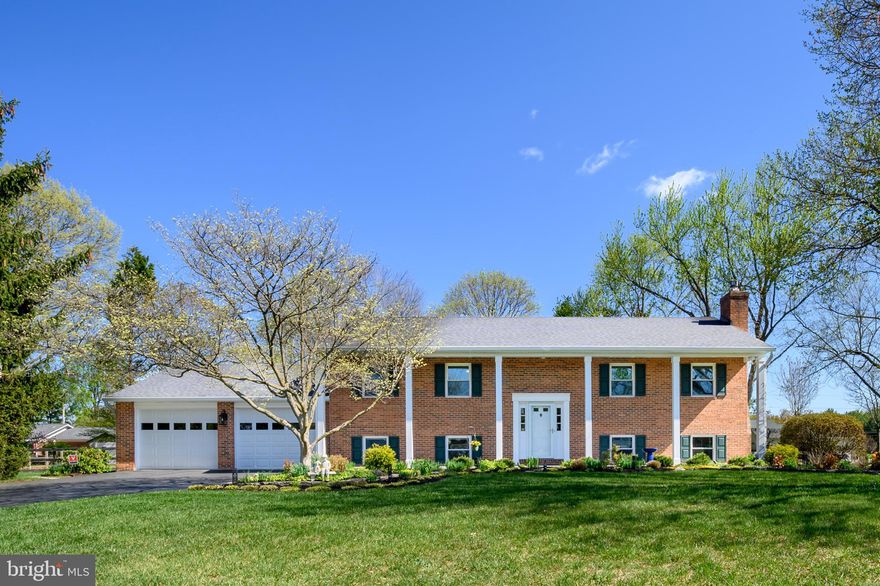 Well maintained and beautifully appointed, this is the home you have been waiting for! Original owners  have recently updated and remodeled this home which is now "move-in ready" for the  lucky buyers! This stately residence, custom built in 1985,  features a brick front  and a welcoming  slate front porch with 6 elegant columns.. Open floorplan  is ideal for comfortable living and entertaining with spacious living room, dining room, and renovated kitchen with custom cabinets, stainless steel appliances and hardwood flooring. Venture outside from the dining room to enjoy the privacy of the 20'x12' screened porch overlooking the fenced  landscaped .53 acre lot. The primary bedroom has an  ensuite remodeled  bath with ceramic floor, dual vanity, and roll in shower with dual heads.  Two additional bedrooms and a full updated bath complete the main level. Spread out and enjoy the finished lower level with huge family room which is sure to be a favorite gathering space. The brick fireplace with gas insert is energy efficient and capable of heating the entire house.  The  generous-sized bedroom  on this level may  also serve as a home office or nanny suite  with half bath nearby including a rough-in for a future shower.  A  300 SF storage area with built-in shelving is ideal for all important collectables. and provides direct access to the 26x26 over-sized 2 car garage featuring insulated doors and automatic openers replaced in 2020. You will enjoy the many special features inside and out including recessed lighting, 5 paddle fans, whole house fan, central vac, alarm system, central sound system, exterior light package and more. Updates abound! Here are the dates. Roof, siding, soffits, gutters, downspouts, front door trim, windows, window shutters, 6 porch columns, and front porch slate replaced /2022. New carpeting and refinished hardwood /2023. LG high speed washer/ 2020 and microwave /2026. New front storm door/ 2025. Baltimore, Washington, and Annapolis commuters will appreciate the choice location with easy access to Routes 29, and 32. The quiet cul de sac is just minutes from schools, shopping, restaurants, and places of worship. Recreation areas are within walking distance including Scotts Cove and Hammond Park. Convenience and comfort are part of the package. Plan to visit this special home today and make Hesperian Dr your new address!