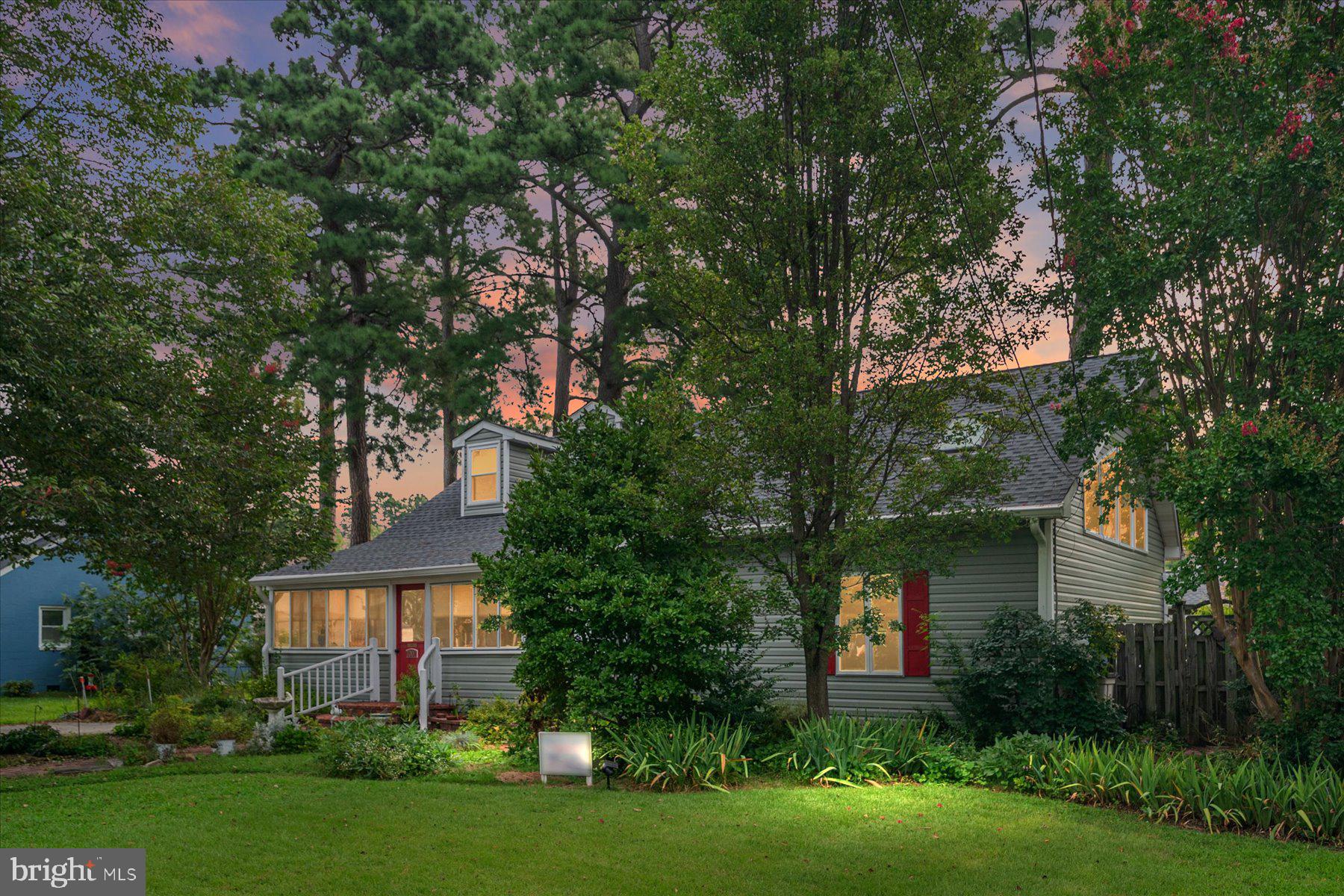 Location, Location, Location! Ideally situated just steps to Herrington Harbour, in the highly sought-after, (rarely available) community of Rose Haven. This extremely well-cared for Cape Cod boasts a new roof, new windows and new siding. Enjoy the large deck with a new 2023 Hot Tub. The large, sunny addition added to the home in 1992 is sure to impress. The addition features soaring vaulted ceilings and a spiral staircase leading to an upper loft area. This home is a woodworker's delight with thoughtful craftsmanship throughout. Custom woodwork is meticulously crafted in this beloved home- the kitchen cabinetry, doors, built-ins, shelves, trim, staircase and wood flooring have all been lovingly done. Along-with a large wood workshop outback, great for any hobby-enthusiast. Rose Haven is perfect for a water-loving lifestyle- all mere steps to enjoying life on the water. This home is truly a MUST-SEE. Schedule your showing today!